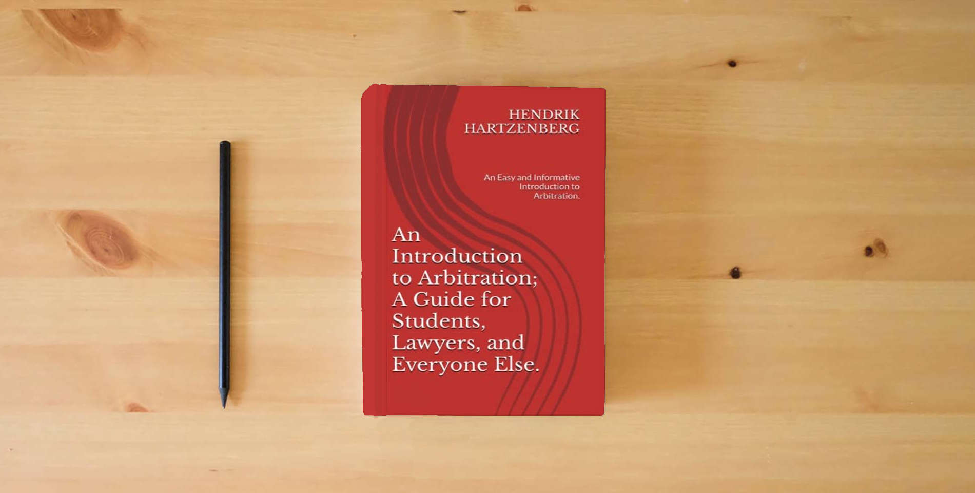 The book An Introduction to Arbitration; A Guide for Students, Lawyers, and Everyone Else.: An Easy and Informative Introduction to Arbitration. is on the table