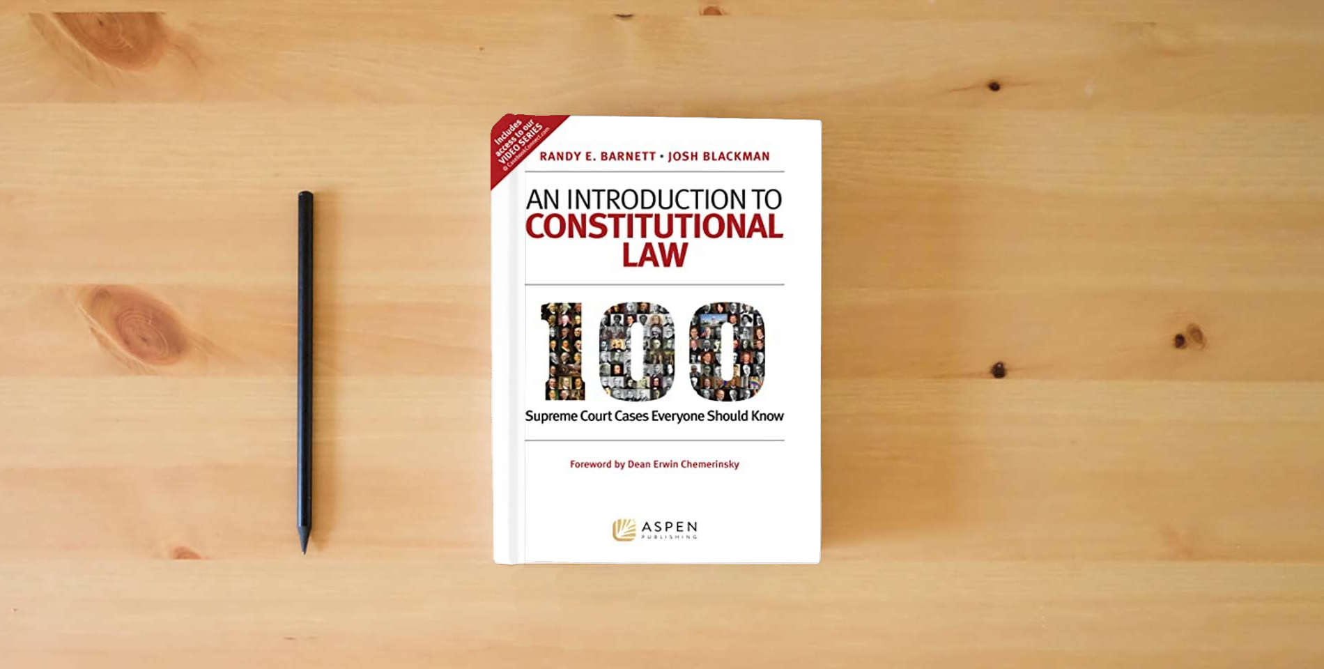 The book An Introduction to Constitutional Law: 100 Supreme Court Cases Everyone Should Know is on the table