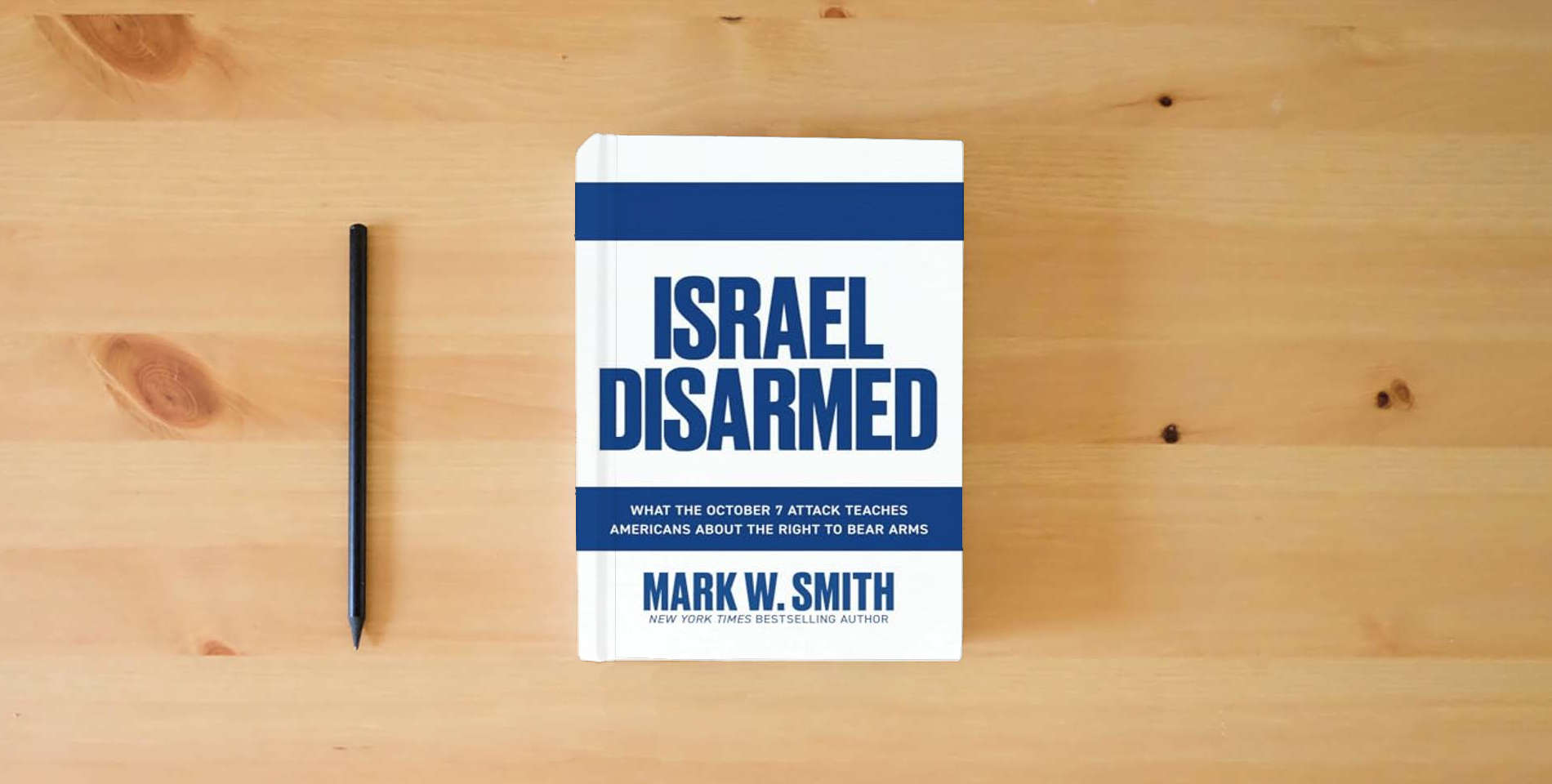 The book Israel Disarmed: What the October 7 Attack Teaches Americans About the Right to Bear Arms is on the table