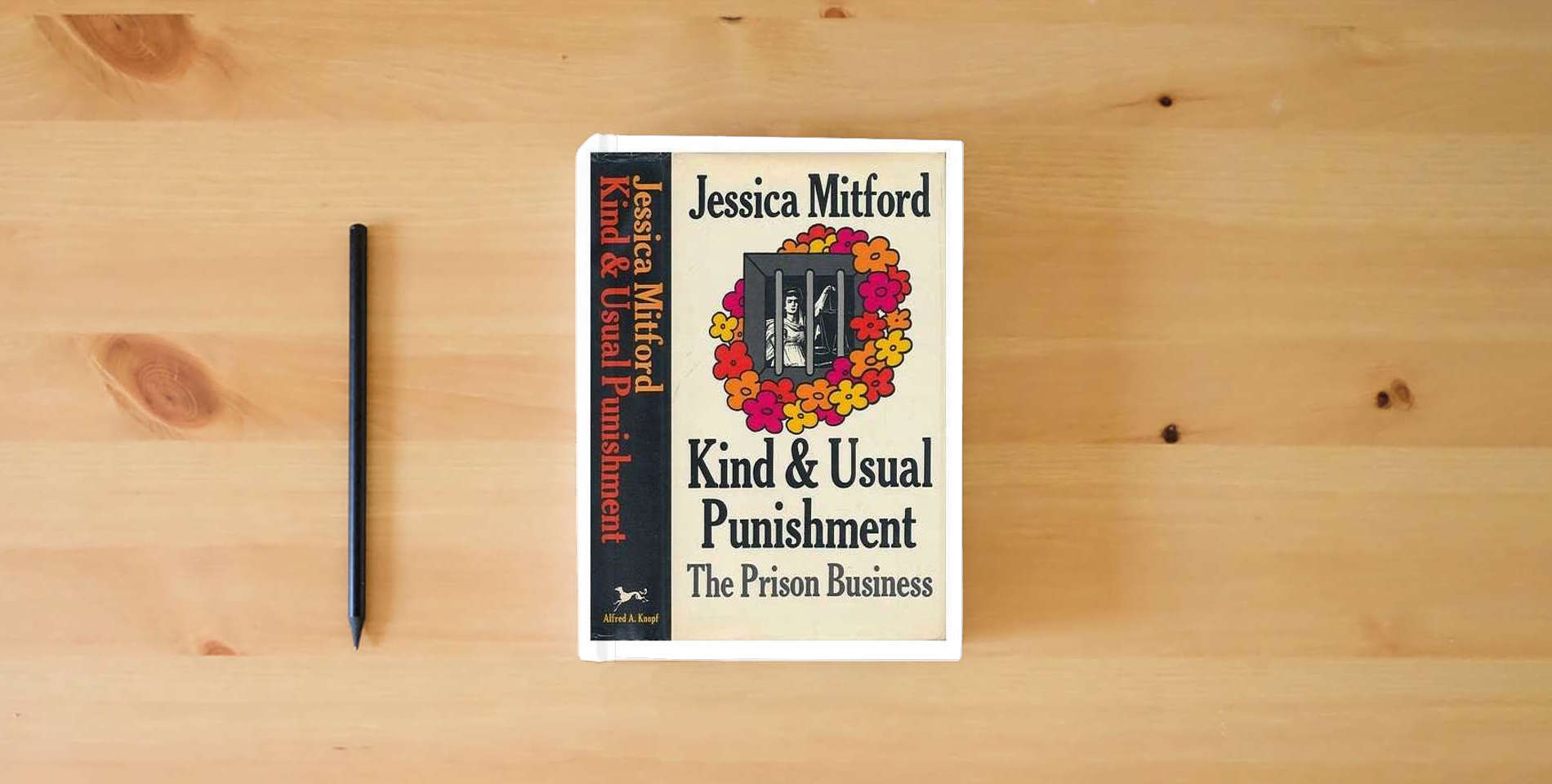 The book Kind and Usual Punishment: The Prison Business is on the table