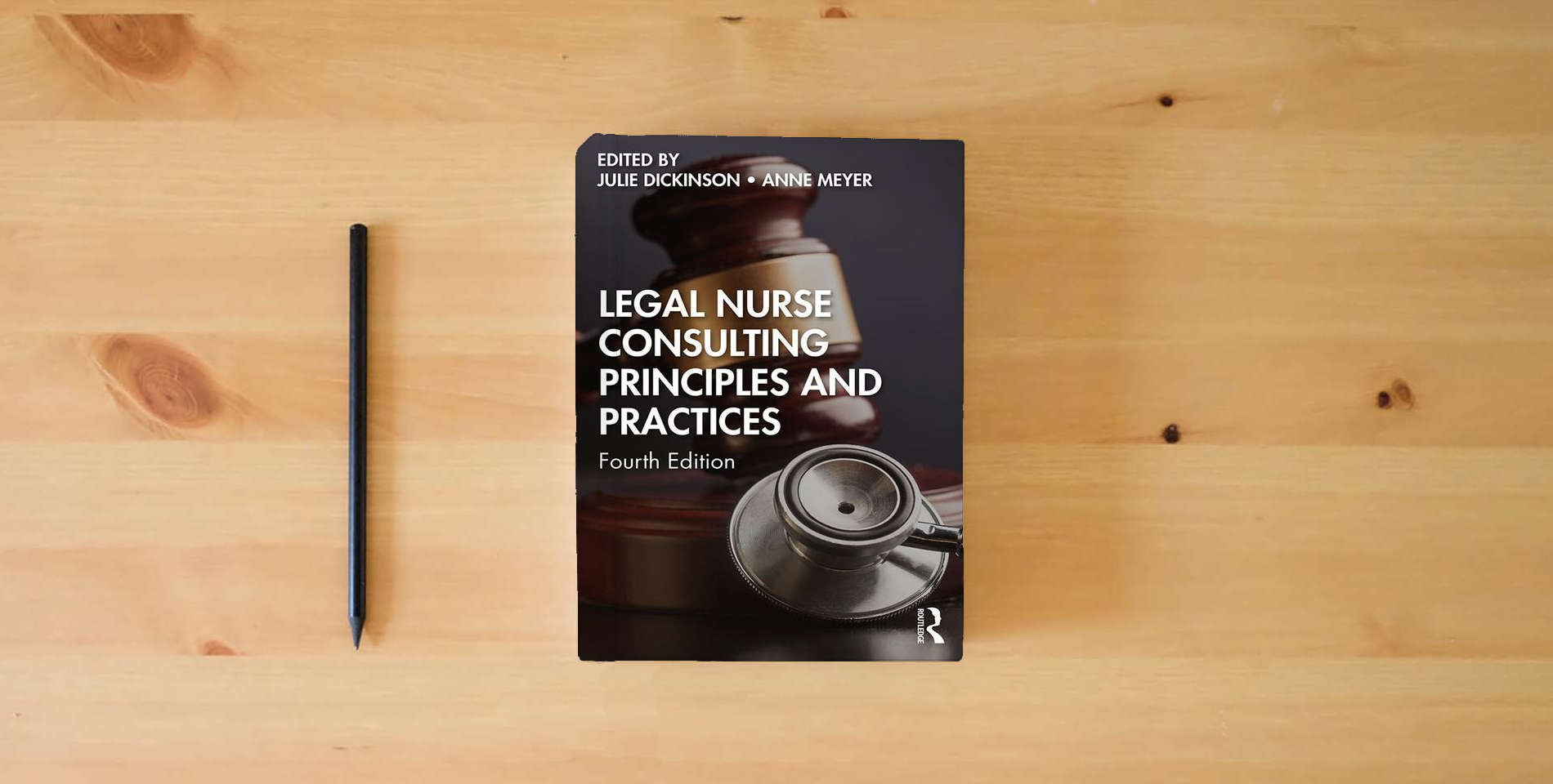 The book Legal Nurse Consulting Principles and Practices is on the table