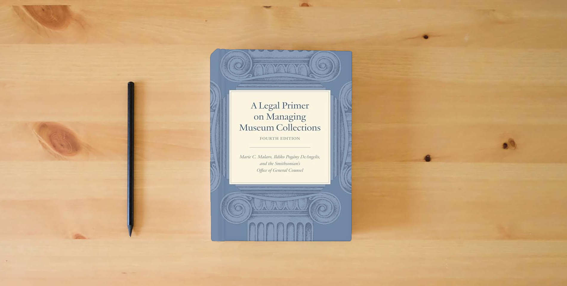 The book A Legal Primer on Managing Museum Collections, Fourth Edition is on the table