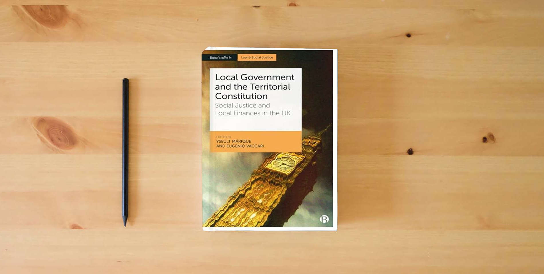 The book Local Government and the Territorial Constitution: Social Justice and Local Finances in the UK (Bristol Studies in Law and Social Justice) is on the table