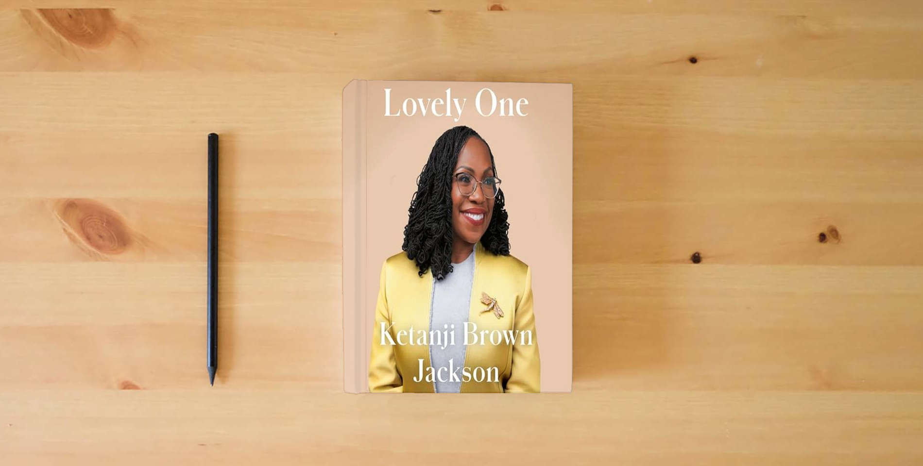The book Lovely One: A Memoir is on the table