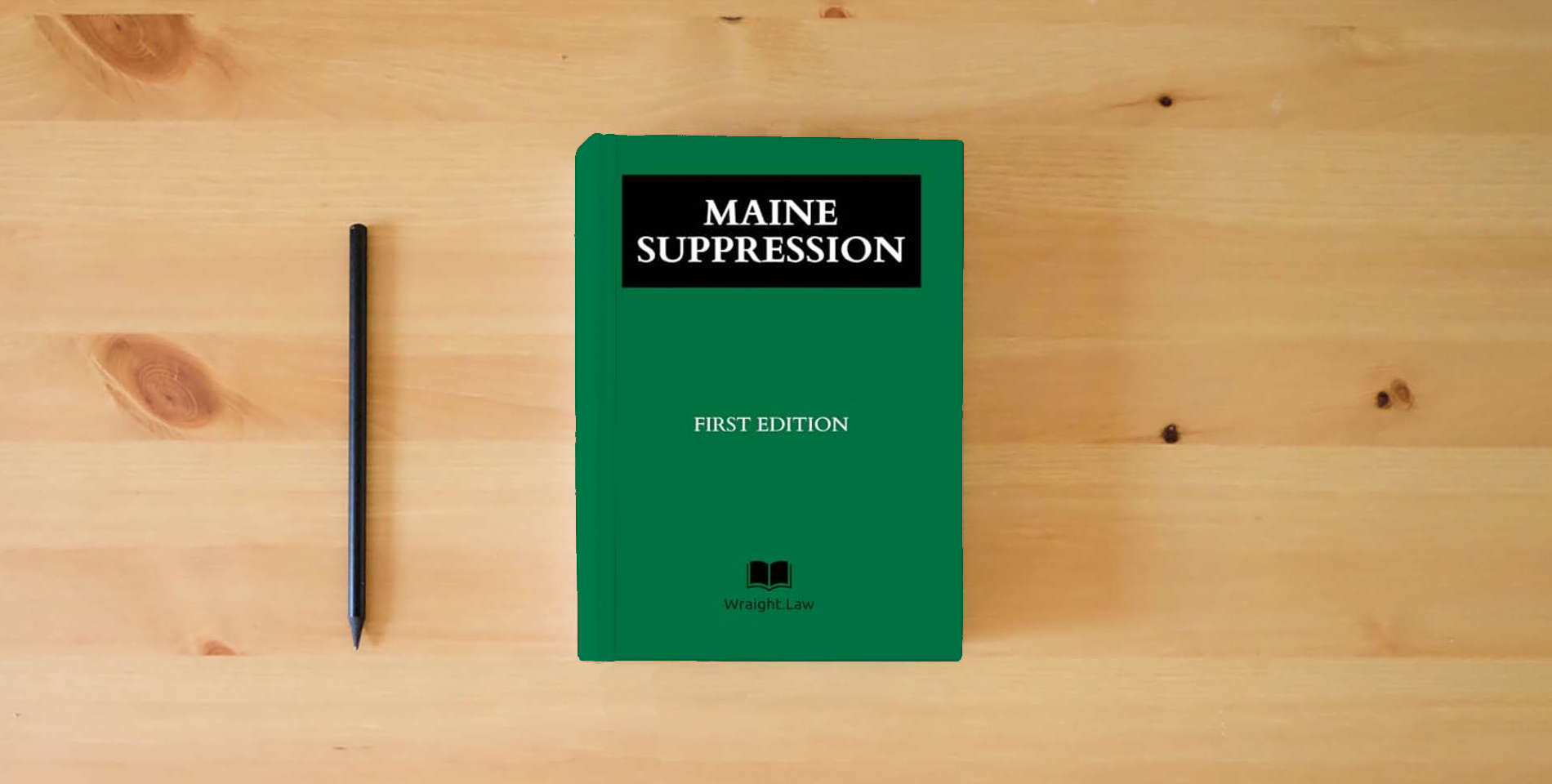 The book Maine Suppression is on the table