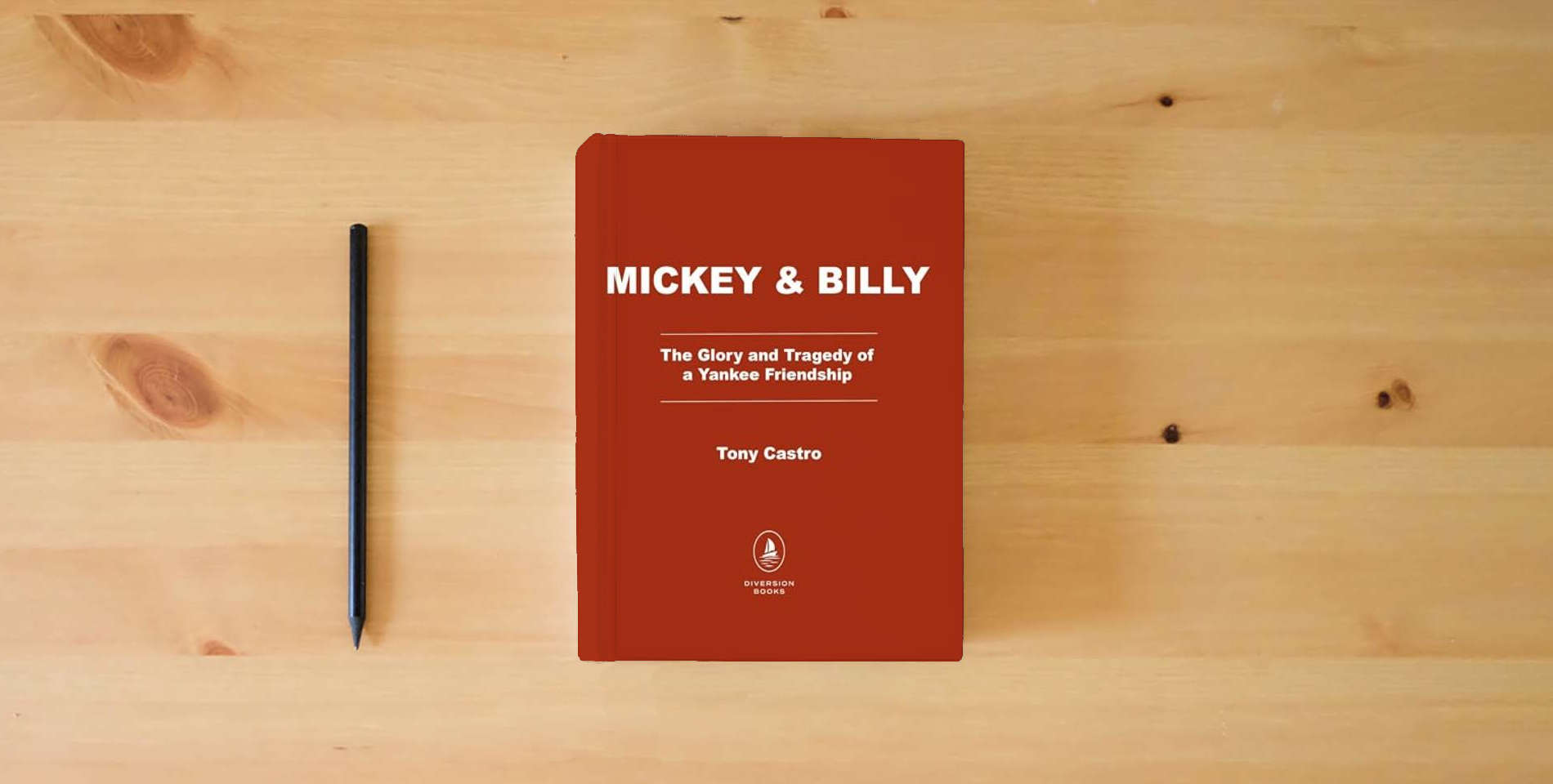 The book Mickey & Billy: The Glory and Tragedy of a Yankee Friendship is on the table