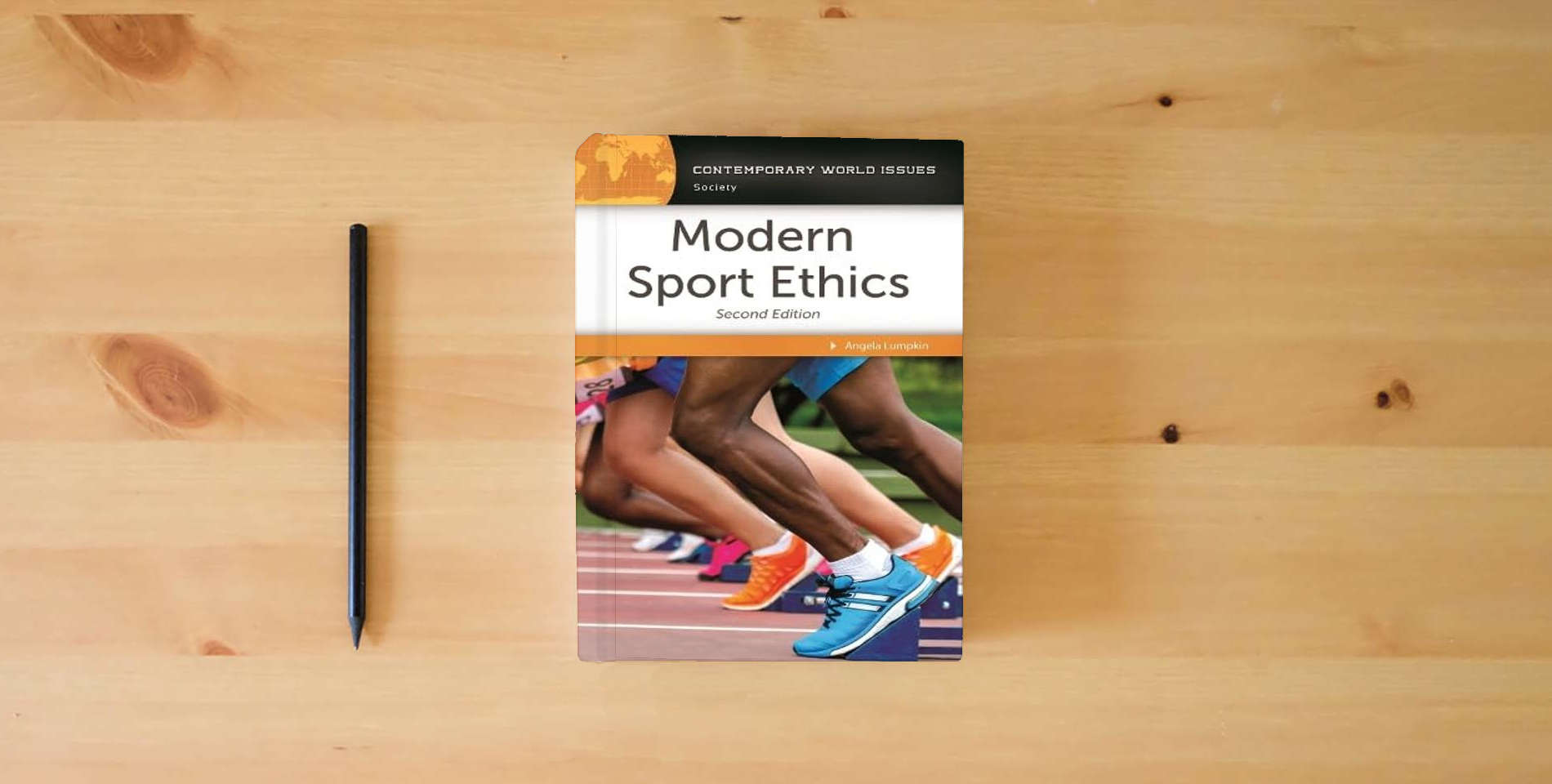 The book Modern Sport Ethics: A Reference Handbook (Contemporary World Issues) is on the table