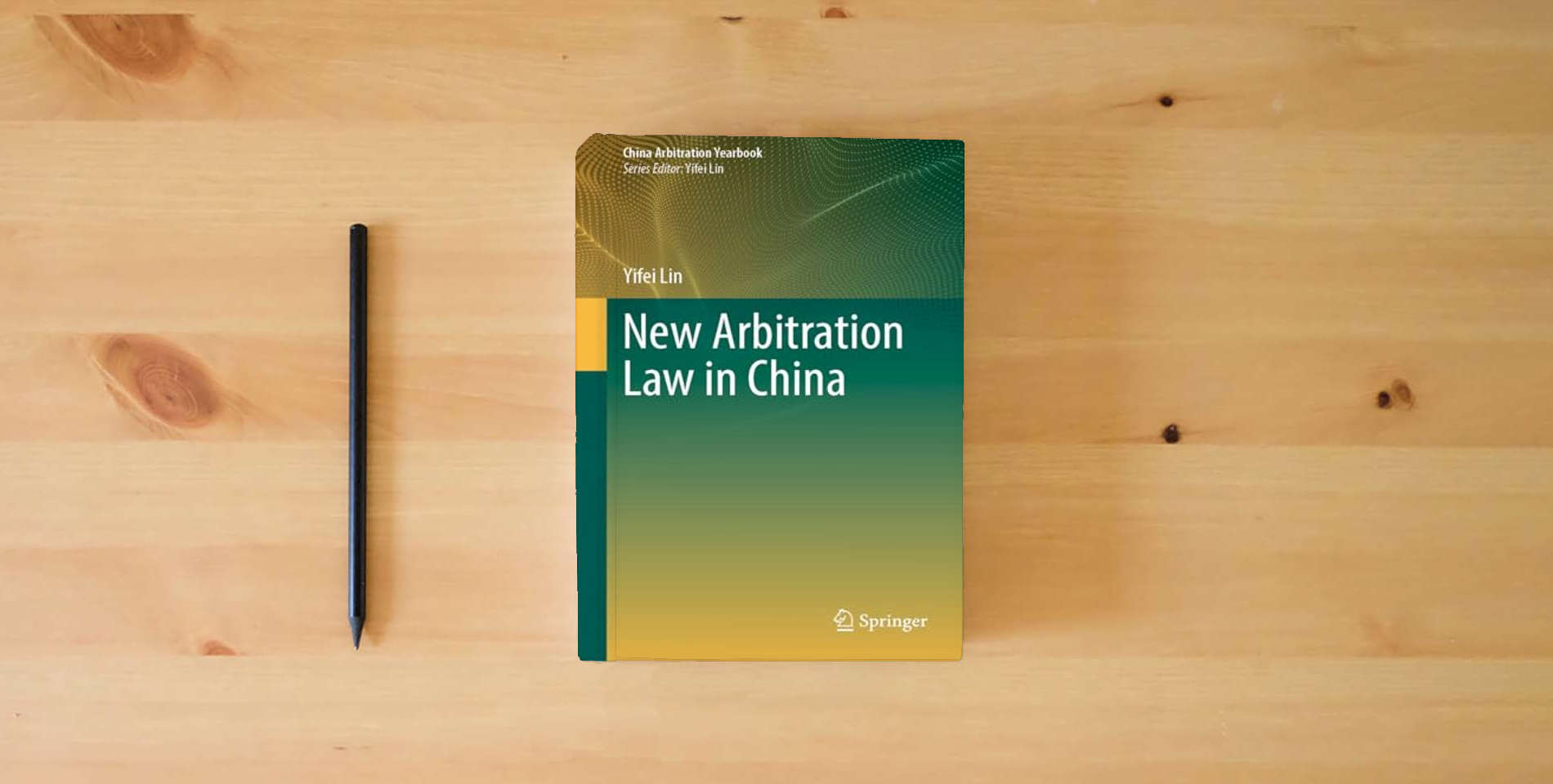 The book New Arbitration Law in China (China Arbitration Yearbook) is on the table
