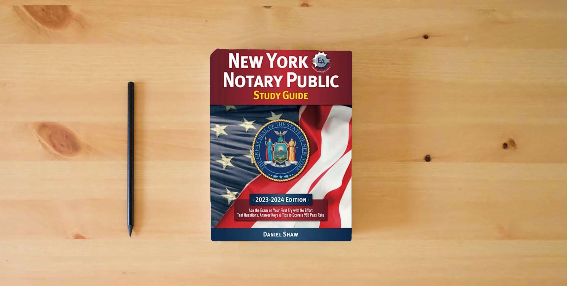 The book New York Notary Public Study Guide: Ace the Exam on Your First Try with No Effort | Test Questions, Answer Keys & Insider Tips to Score a 98% Pass Rate is on the table