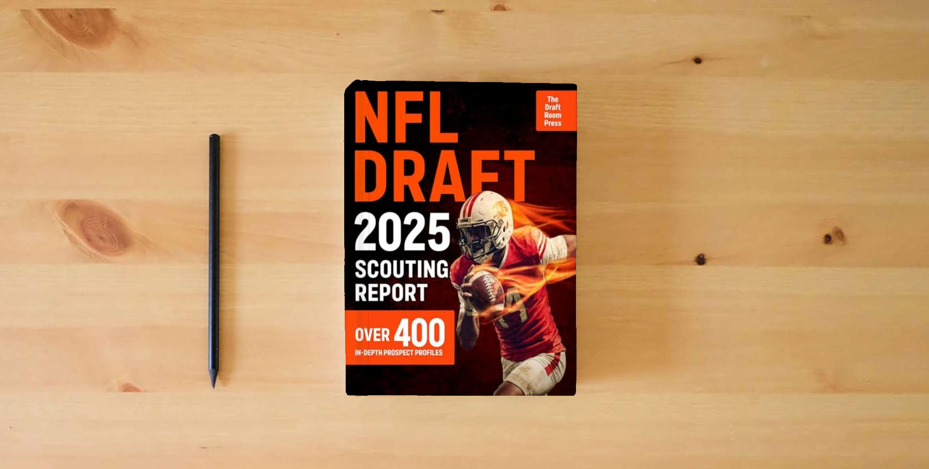 The book NFL Draft 2025 Scouting Report: Over 400 In-Depth Prospect Profiles with Advanced Stats, Scouting Grades & Ideal Team Fits to Predict the Next NFL Stars is on the table
