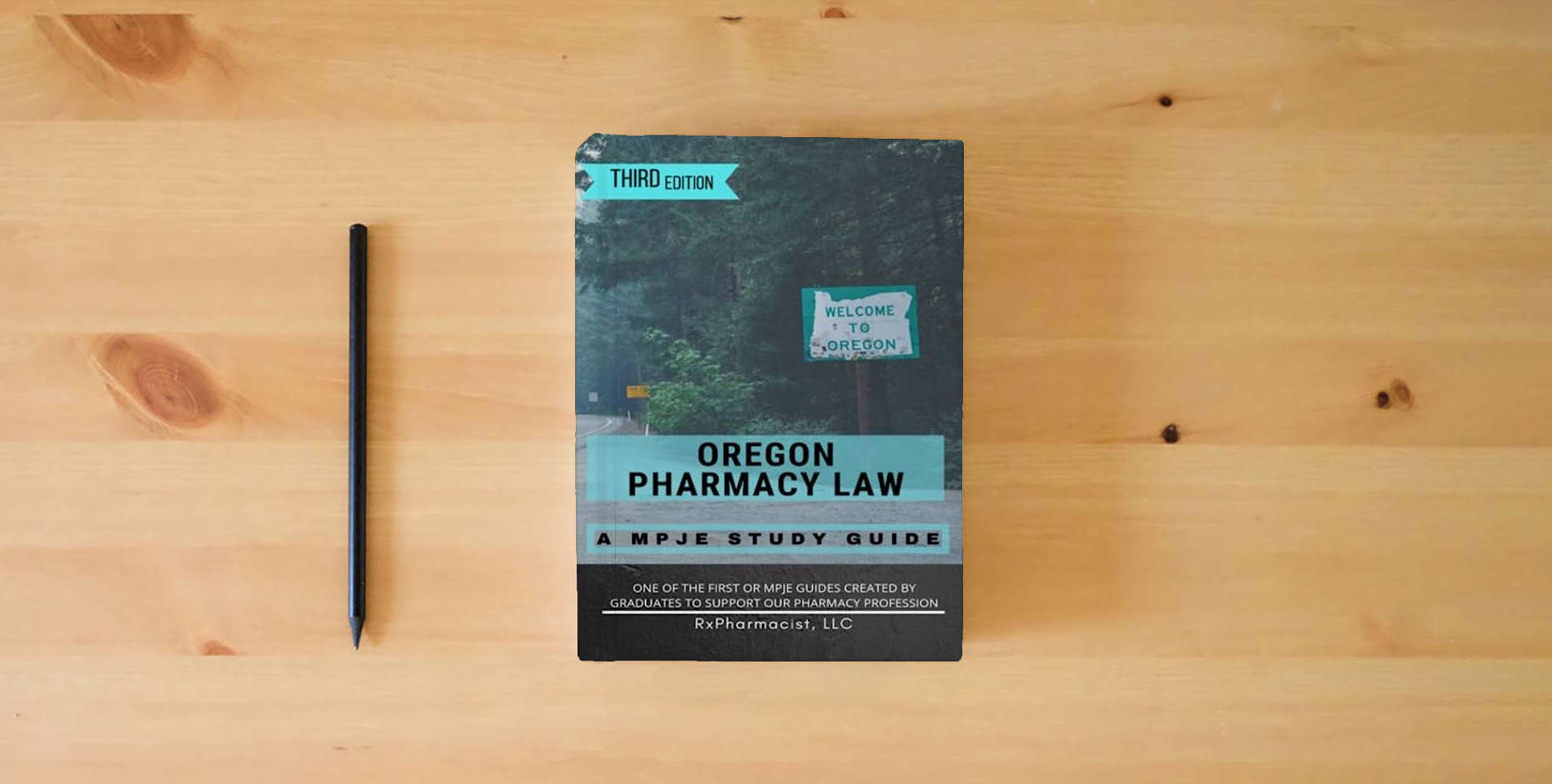The book Oregon Pharmacy Law: A MPJE Study Guide is on the table