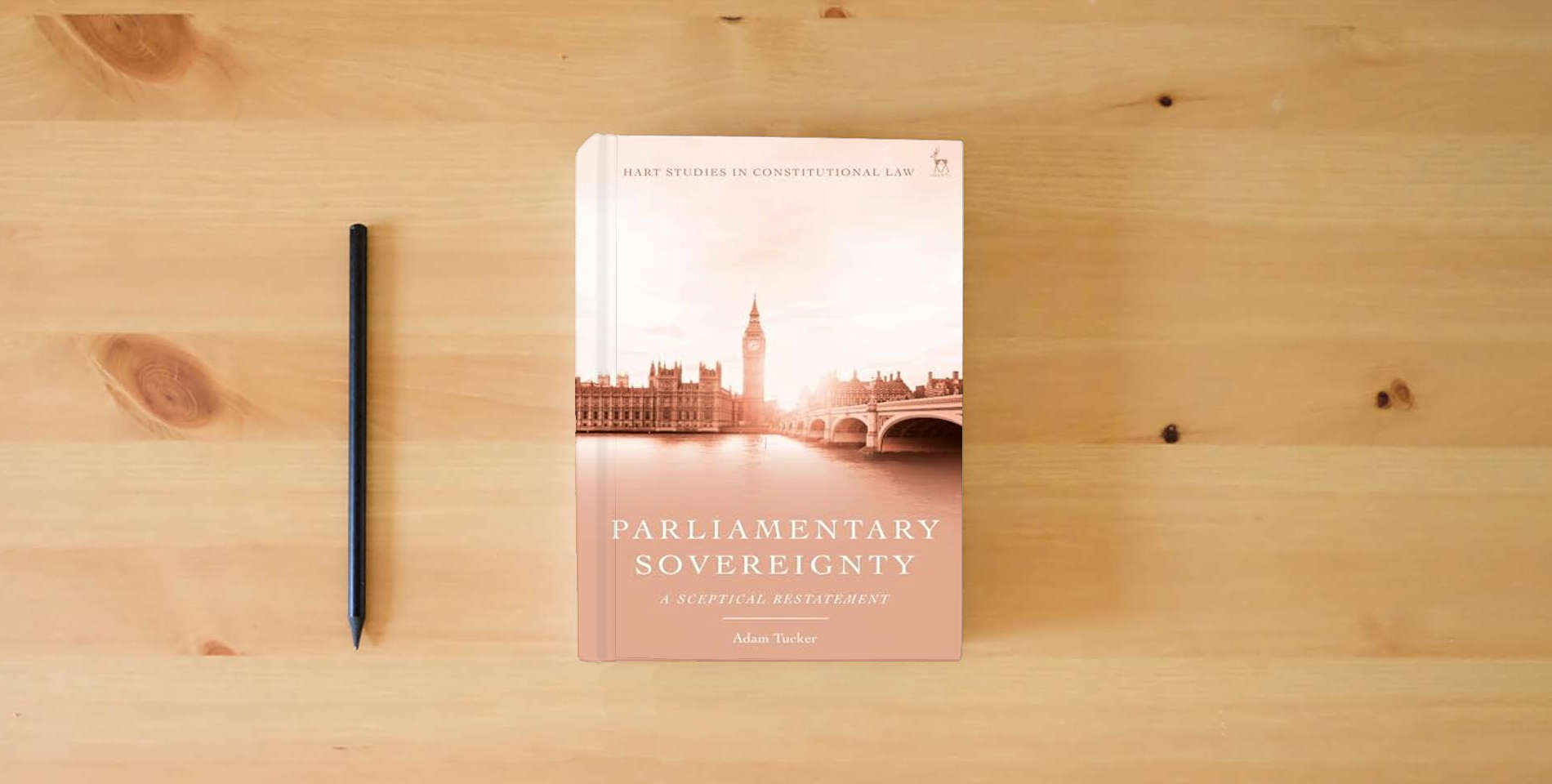 The book Parliamentary Sovereignty: A Sceptical Restatement (Hart Studies in Constitutional Law) is on the table
