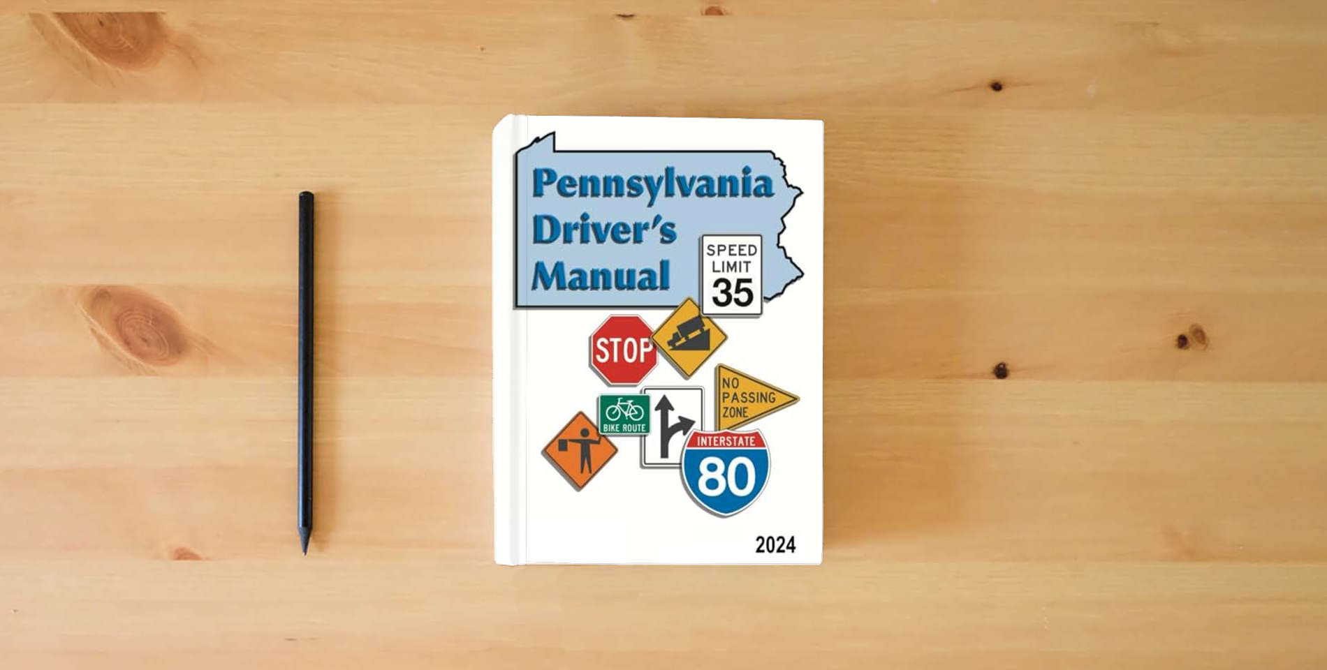 The book Pennsylvania Driver's Manual: (2024) - Learners Permit Study Guide & Exam Workbook, 184 Questions & Answers - Full Size (8.5'' x 11") is on the table