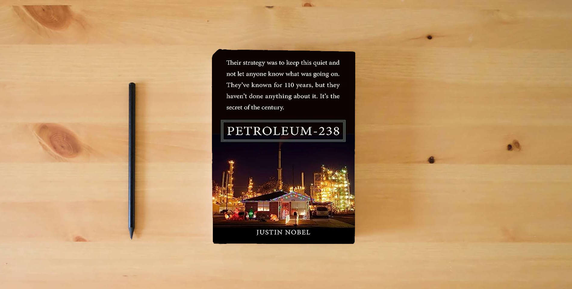 The book Petroleum-238 is on the table