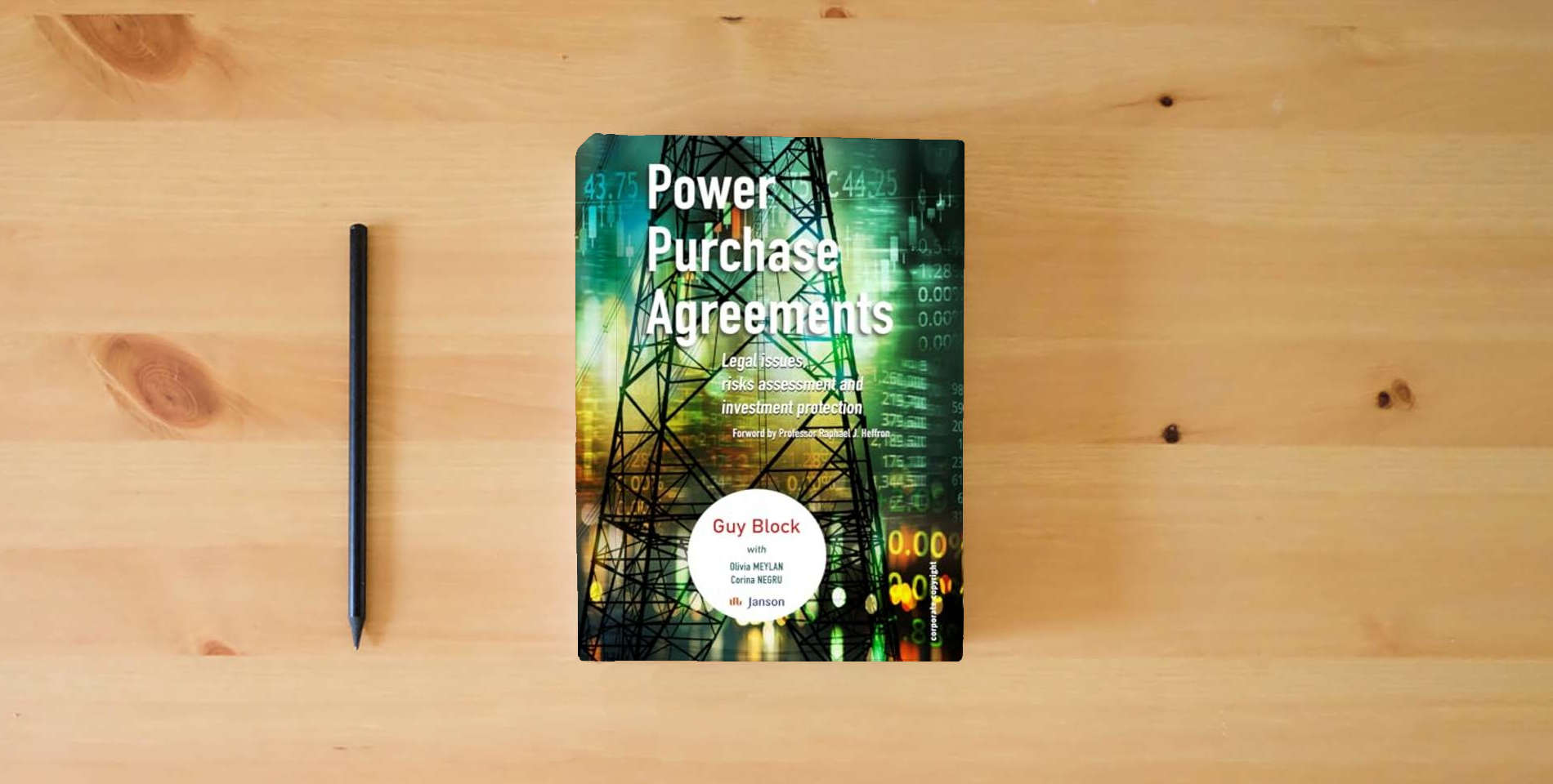 The book Power Purchase Agreements: Legal issues, risks assessment and investment protection is on the table
