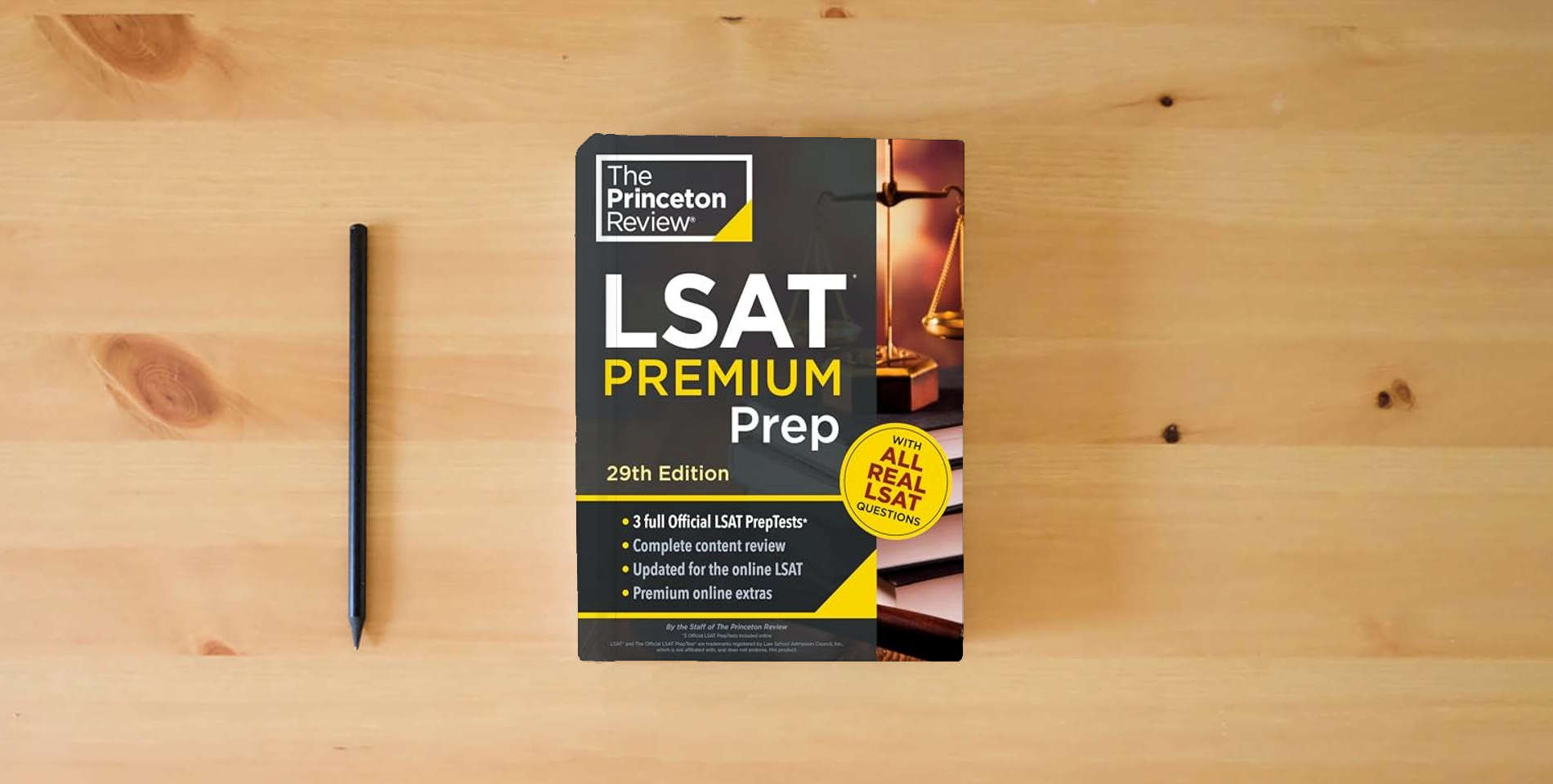 The book Princeton Review LSAT Premium Prep, 29th Edition: 3 Real LSAT PrepTests + Strategies & Review (Graduate School Test Preparation) is on the table