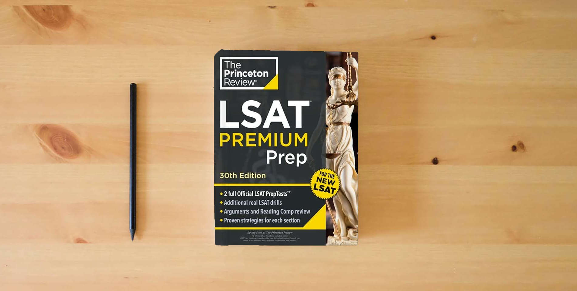 The book Princeton Review LSAT Premium Prep, 30th Edition: 2 Official LSAT PrepTests + Real LSAT Drills + Review for the New Exam (Graduate School Test Preparation) is on the table