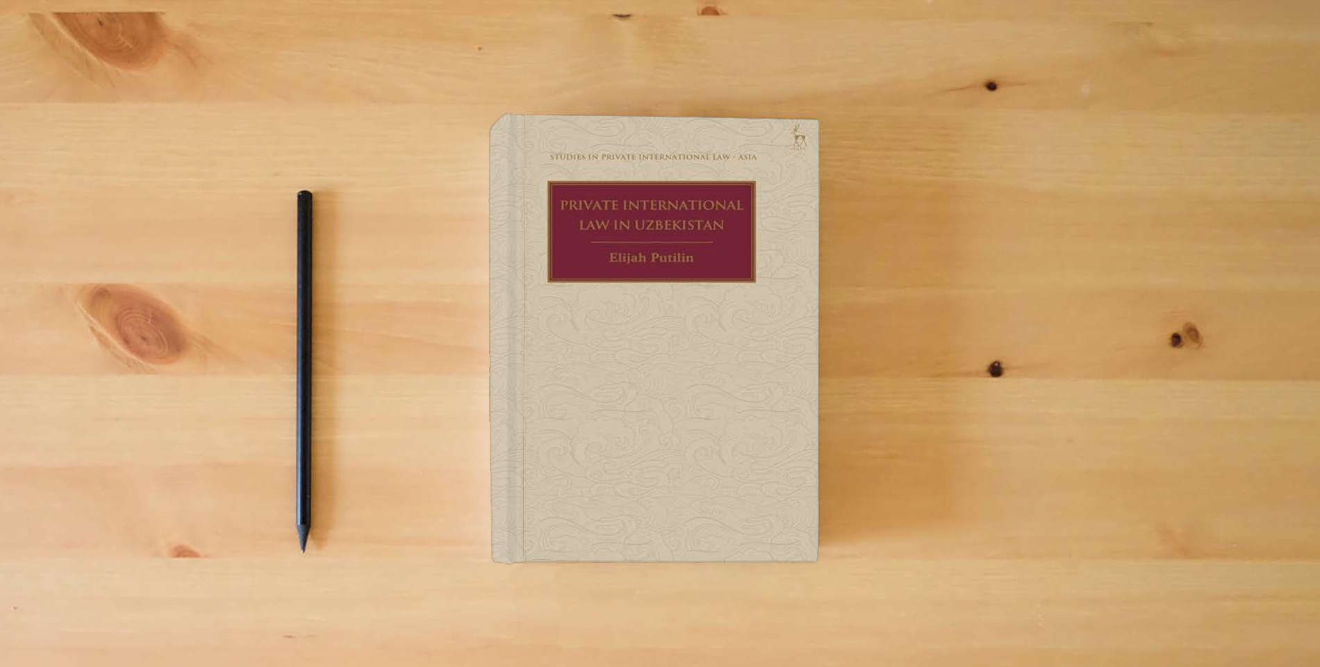 The book Private International Law in Uzbekistan (Studies in Private International Law - Asia) is on the table