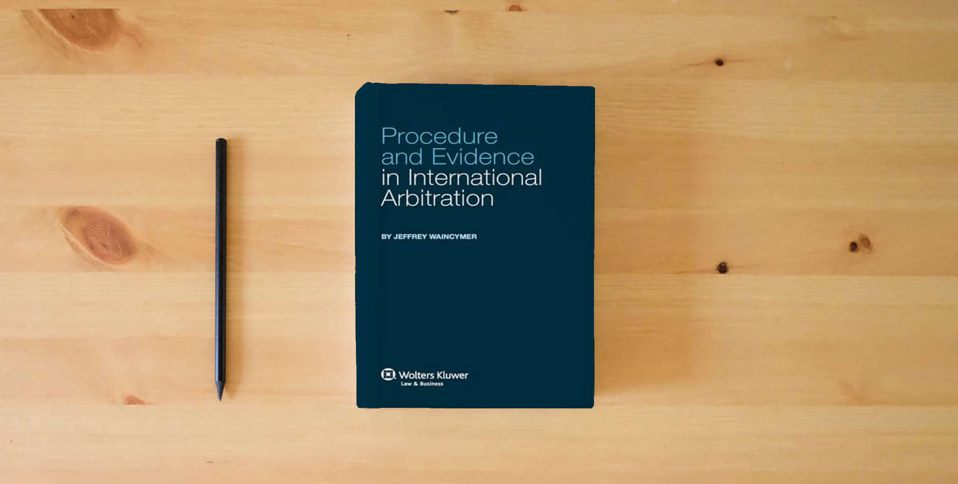 The book Procedure and Evidence in International Arbitration is on the table