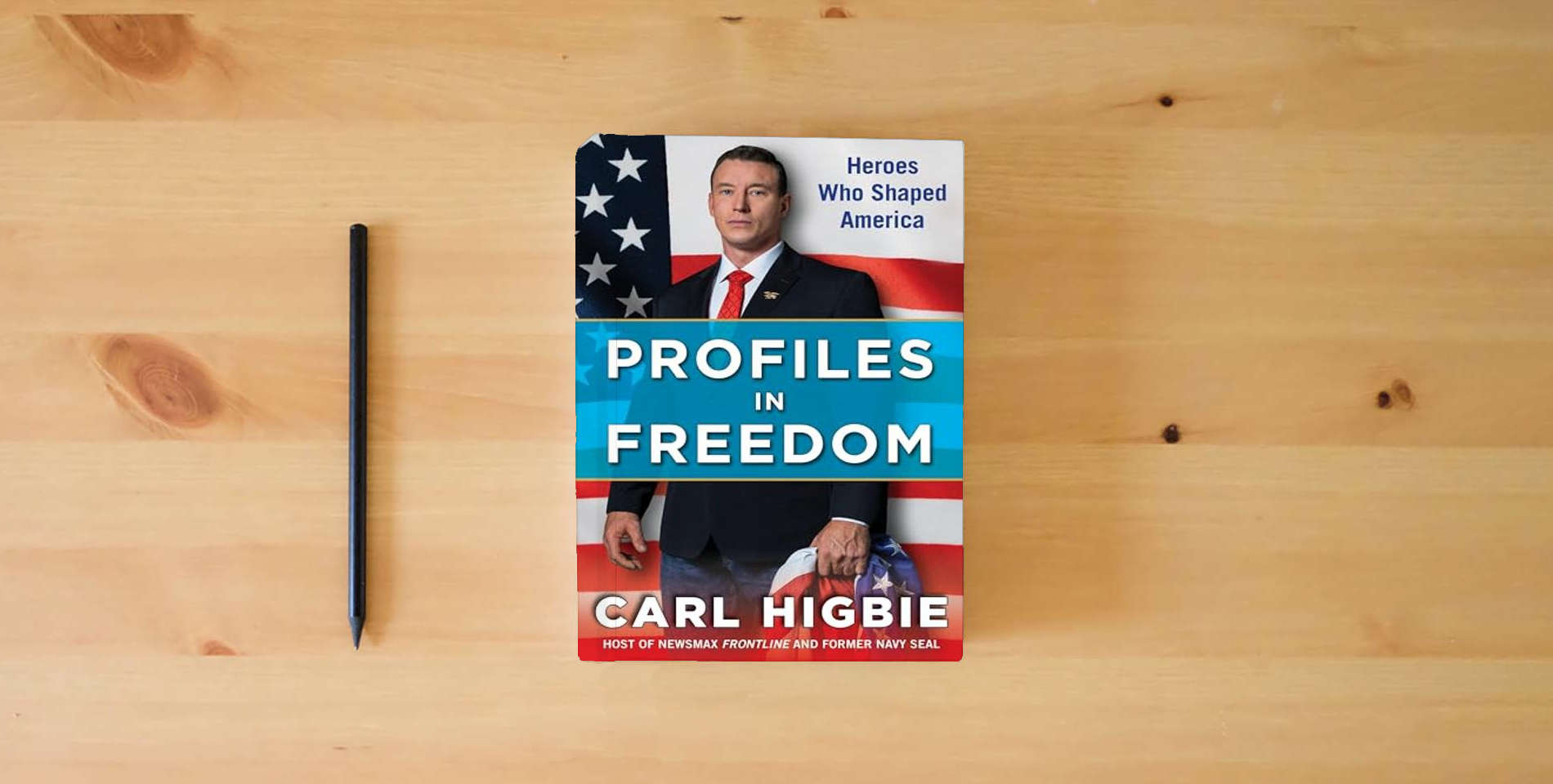 The book Profiles in Freedom: Heroes Who Shaped America with a Foreword by Senator Markwayne Mullin is on the table