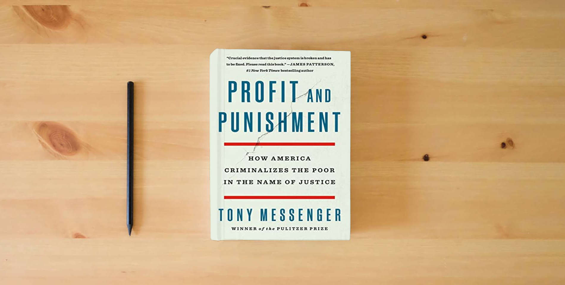 The book Profit and Punishment: How America Criminalizes the Poor in the Name of Justice is on the table