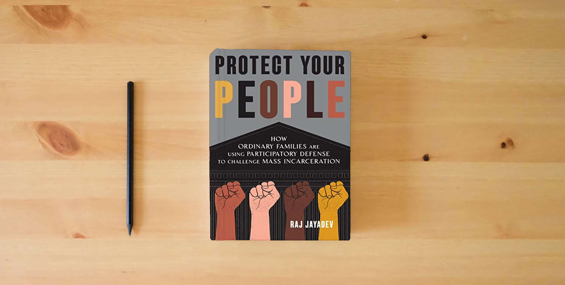 The book Protect Your People: How Ordinary Families Are Using Participatory Defense to Challenge Mass Incarceration is on the table