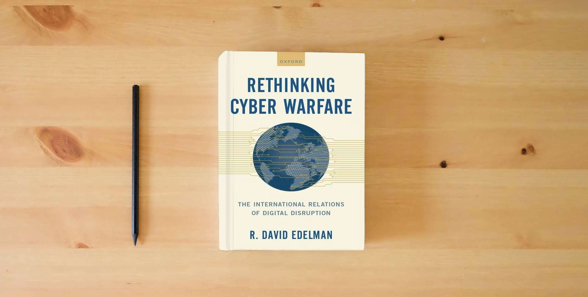 The book Rethinking Cyber Warfare: The International Relations of Digital Disruption is on the table
