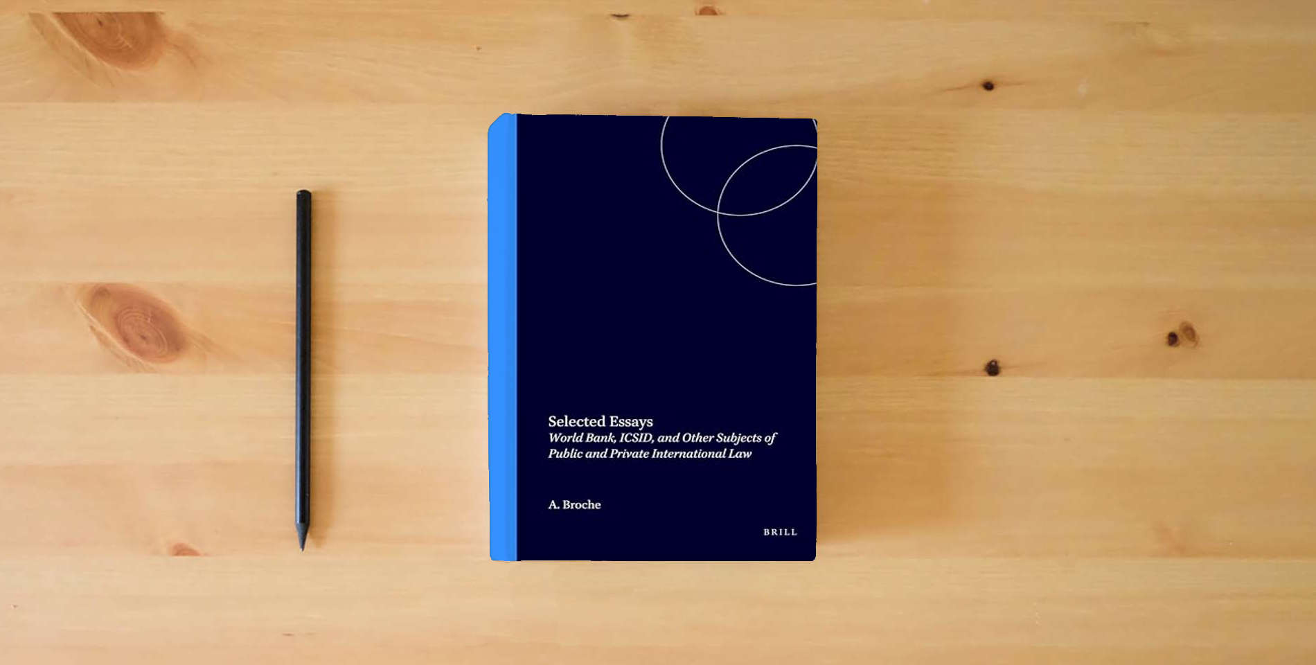 The book Selected Essays: World Bank, ICSID, and Other Subjects of Public and Private International Law is on the table