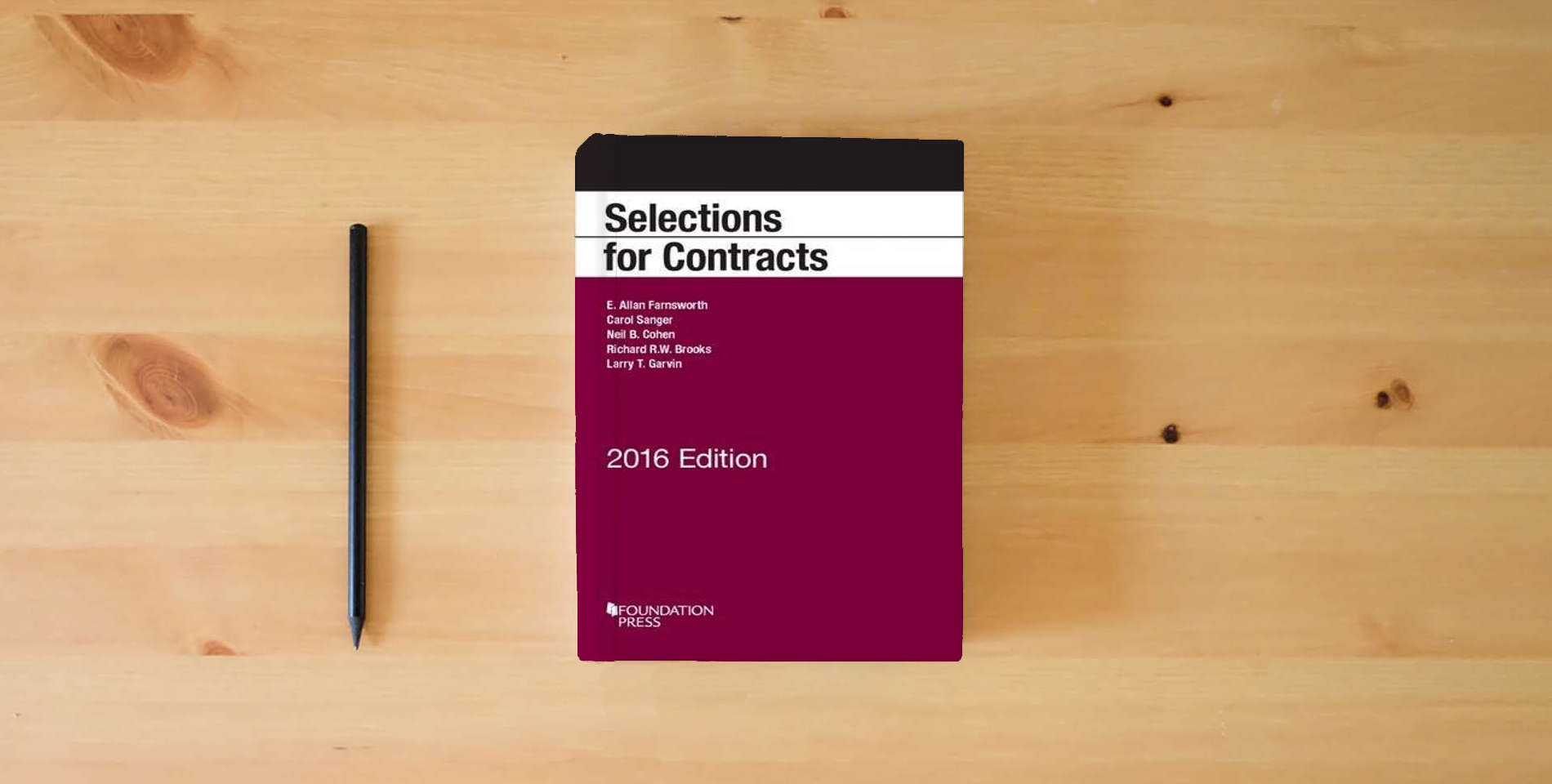 The book Selections for Contracts: 2016 Edition (Selected Statutes) is on the table