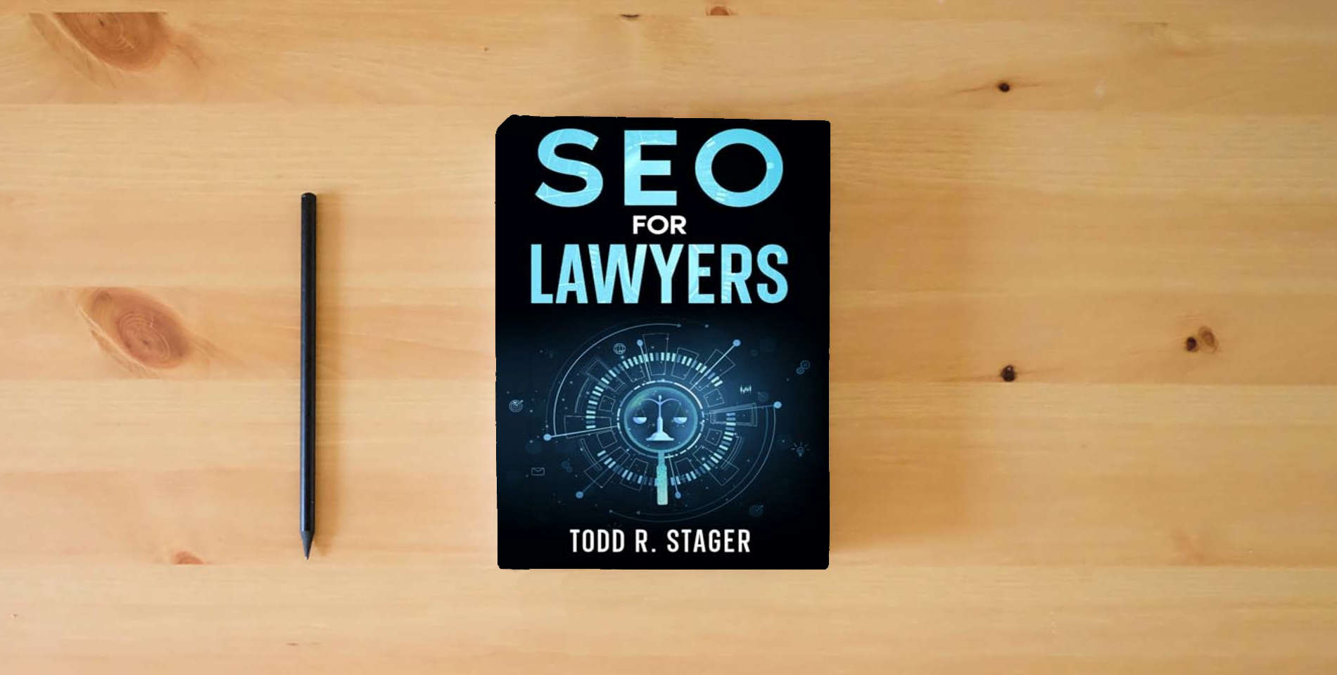 The book SEO for LAWYERS: The Ultimate Guide to Dominating Search Rankings, Attracting Clients, and Skyrocketing Your Firm's Growth in the Digital Age is on the table