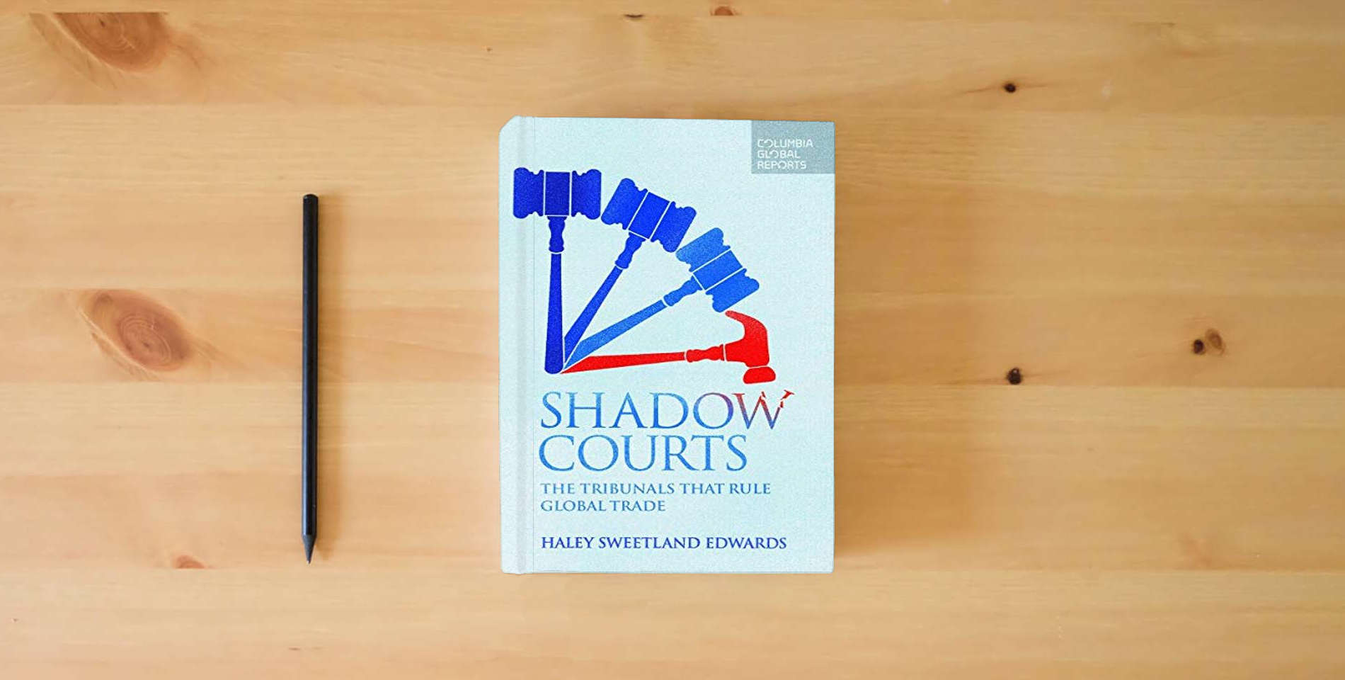 The book Shadow Courts: The Tribunals that Rule Global Trade is on the table
