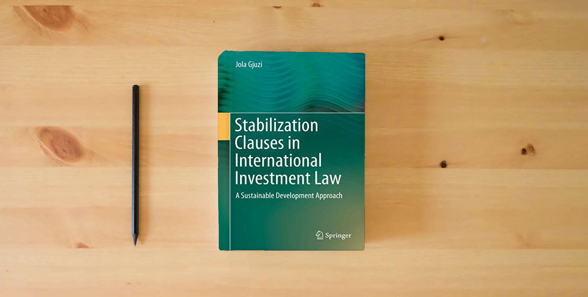 The book Stabilization Clauses in International Investment Law: A Sustainable Development Approach is on the table