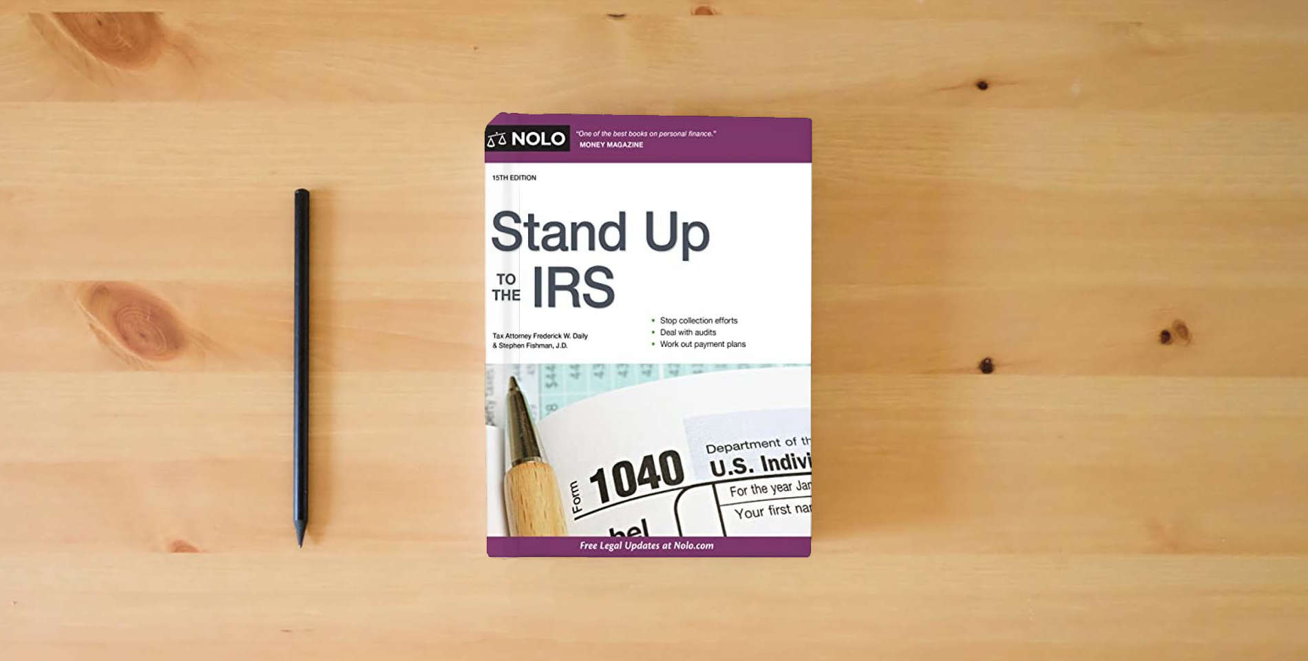 The book Stand Up to the IRS is on the table