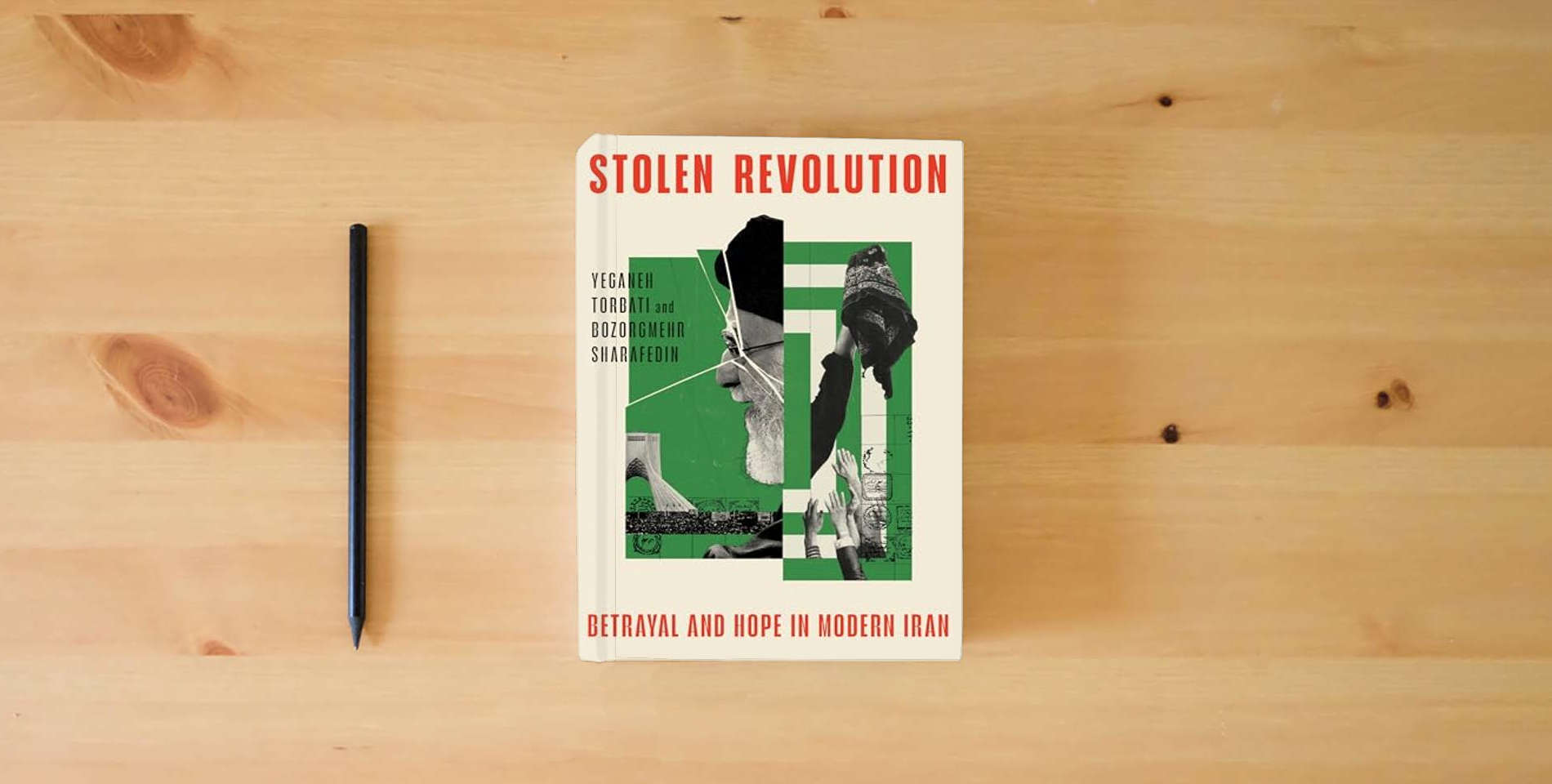 The book Stolen Revolution: Betrayal and Hope in Modern Iran is on the table