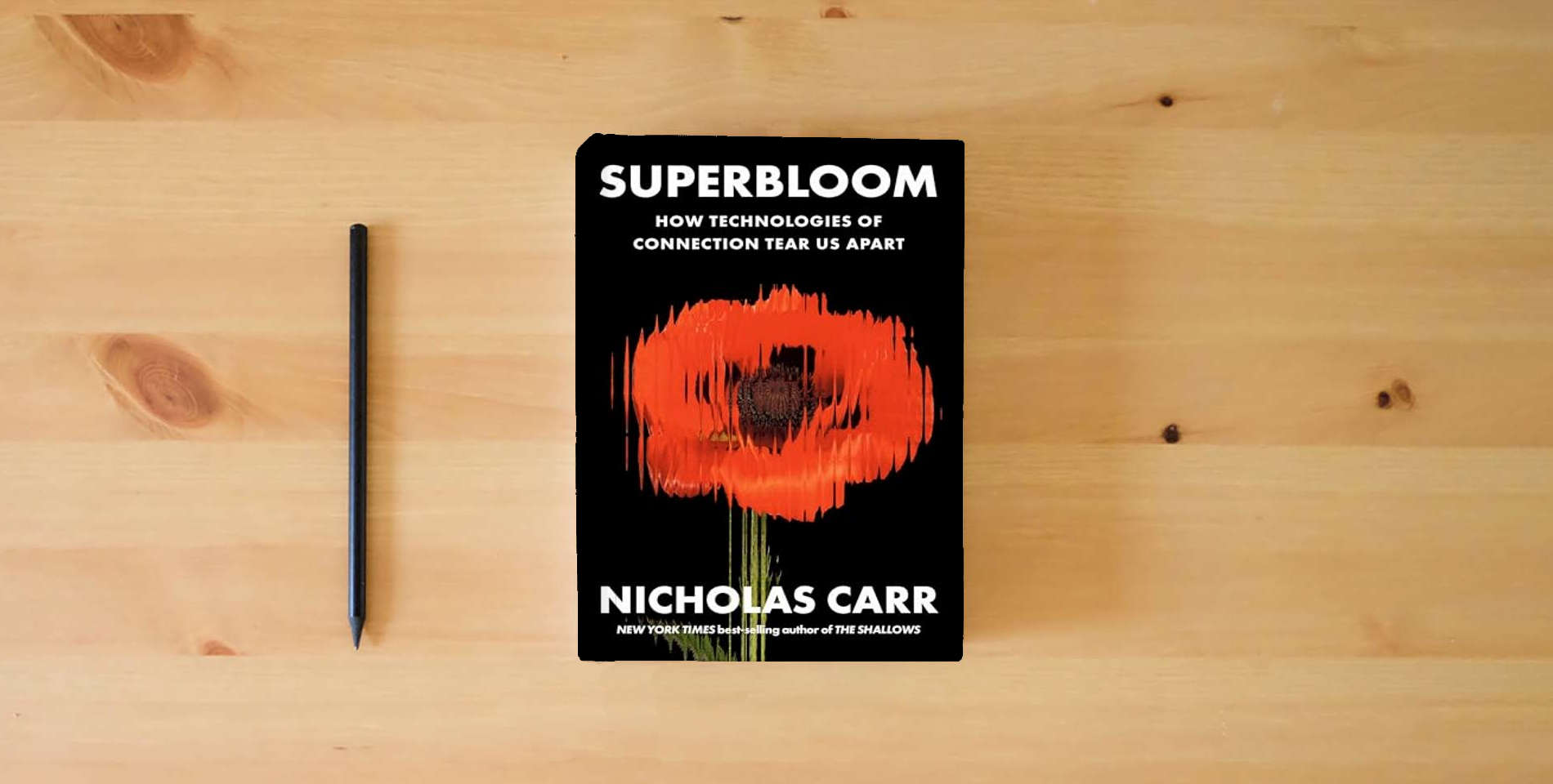 The book Superbloom: How Technologies of Connection Tear Us Apart is on the table