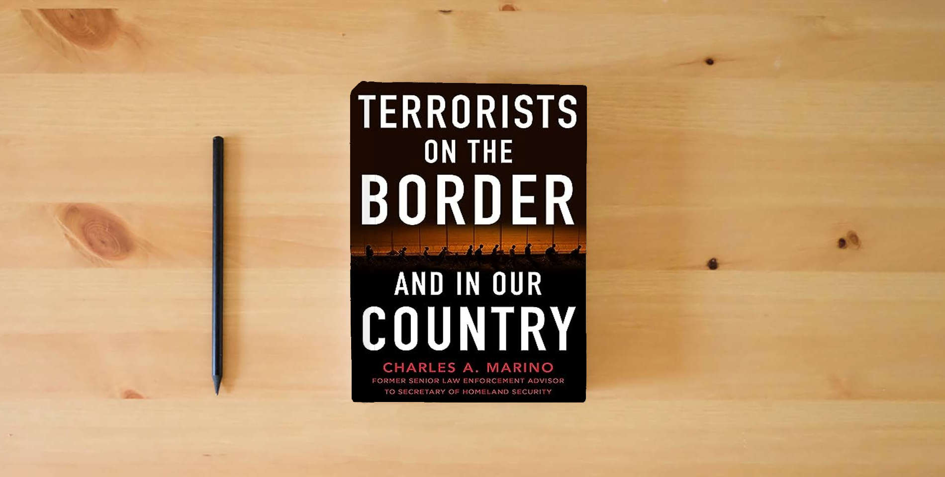 The book Terrorists on the Border and in Our Country is on the table