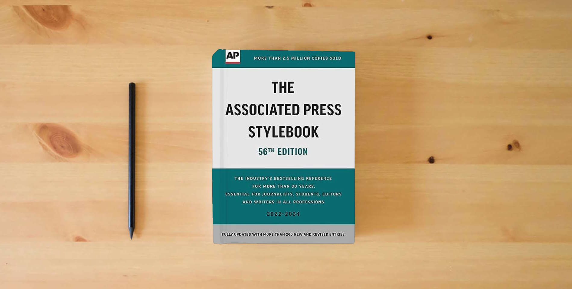 The book The Associated Press Stylebook: 2022-2024 is on the table