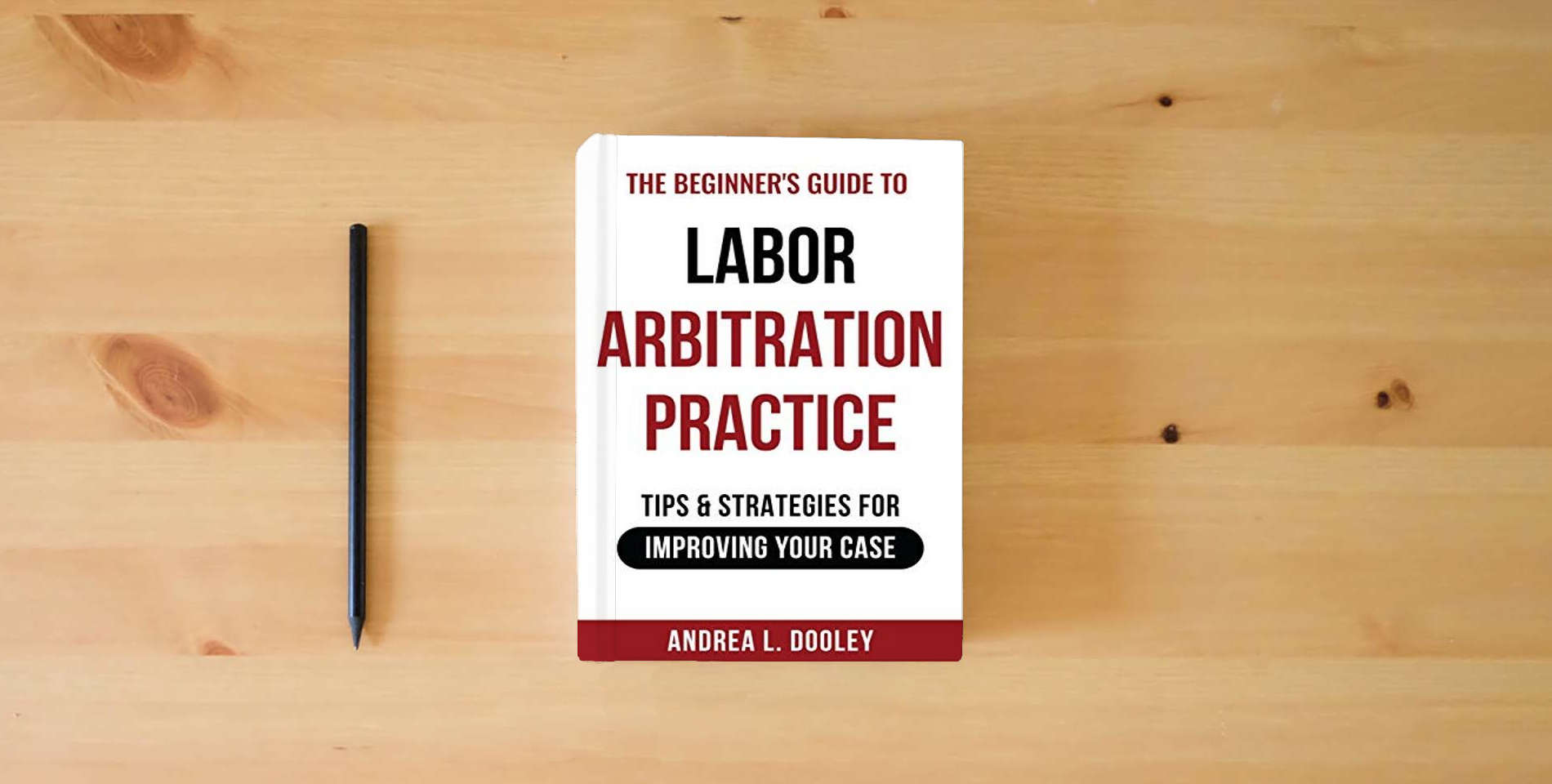 The book The Beginner's Guide to Labor Arbitration Practice: Tips & Strategies for Improving Your Case is on the table
