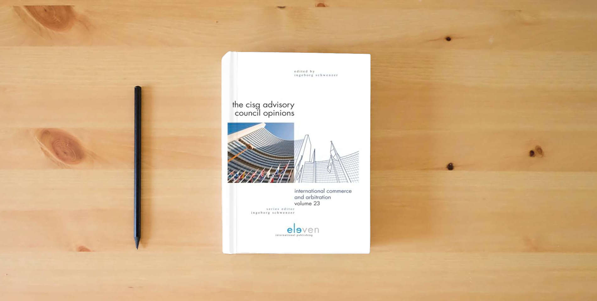 The book The CISG Advisory Council Opinions (23) (International Commerce and Arbitration) is on the table