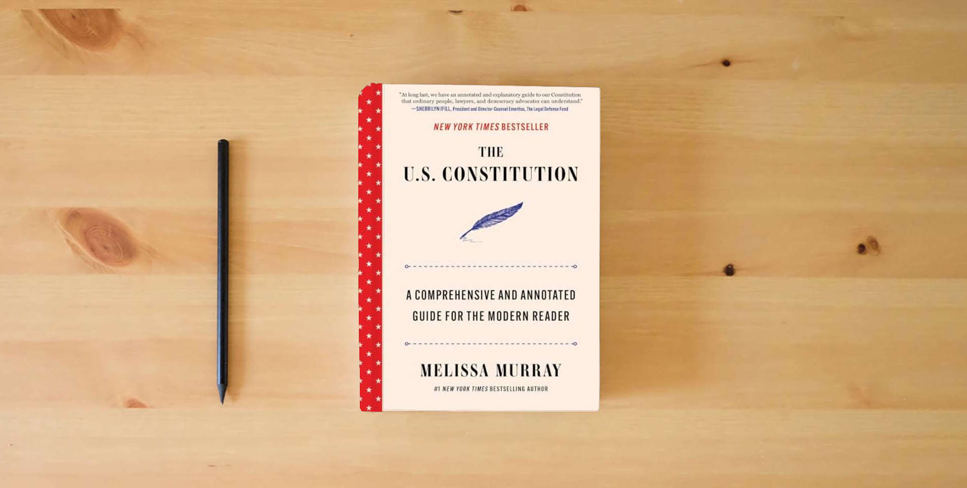 The book The U.S. Constitution: A Comprehensive and Annotated Guide for the Modern Reader is on the table