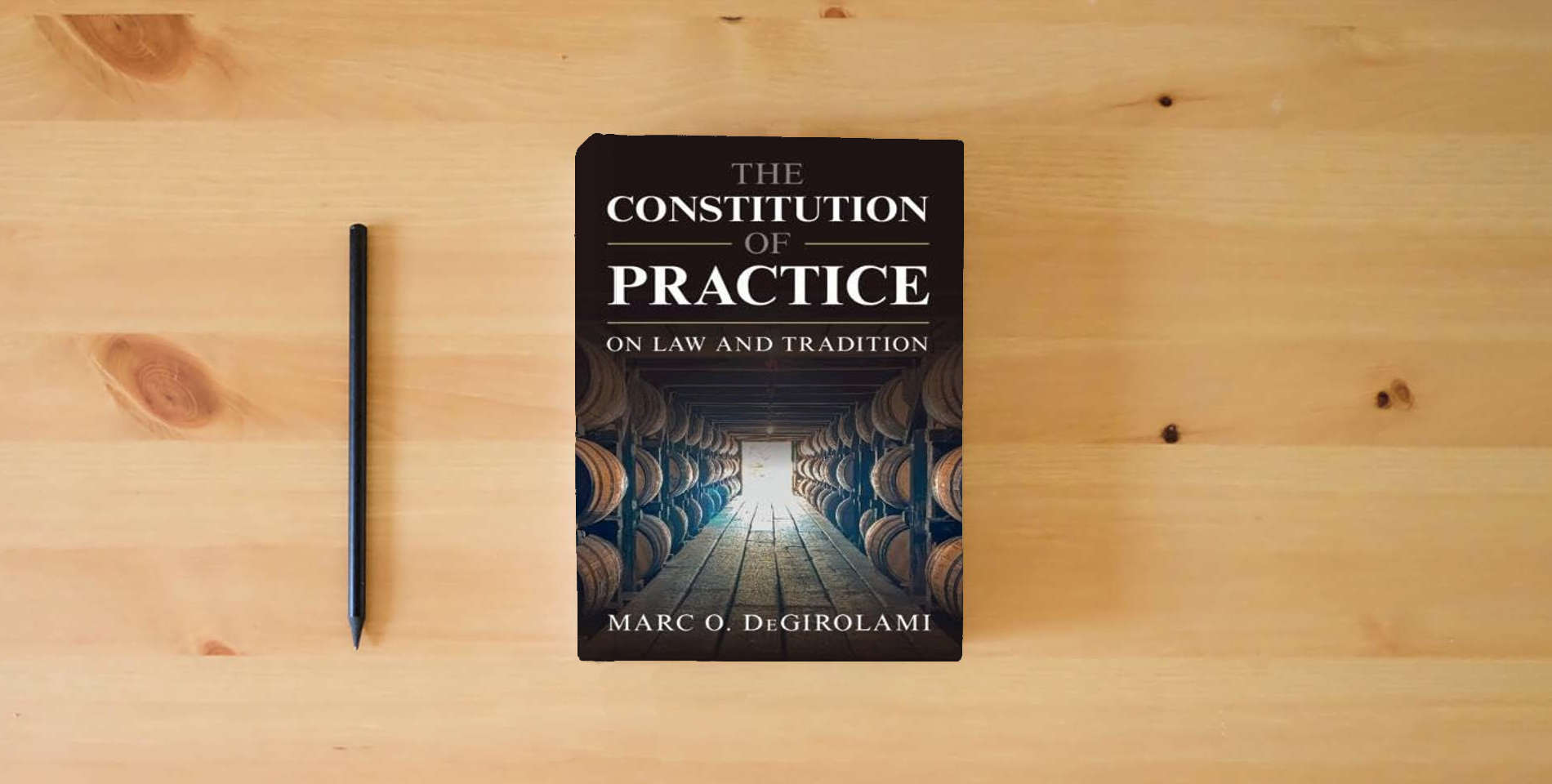 The book The Constitution of Practice: On Law and Tradition is on the table