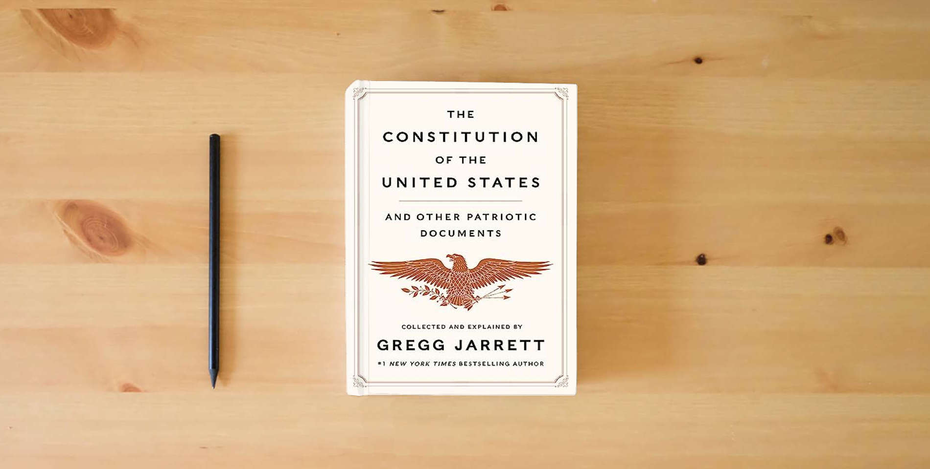 The book The Constitution of the United States and Other Patriotic Documents is on the table