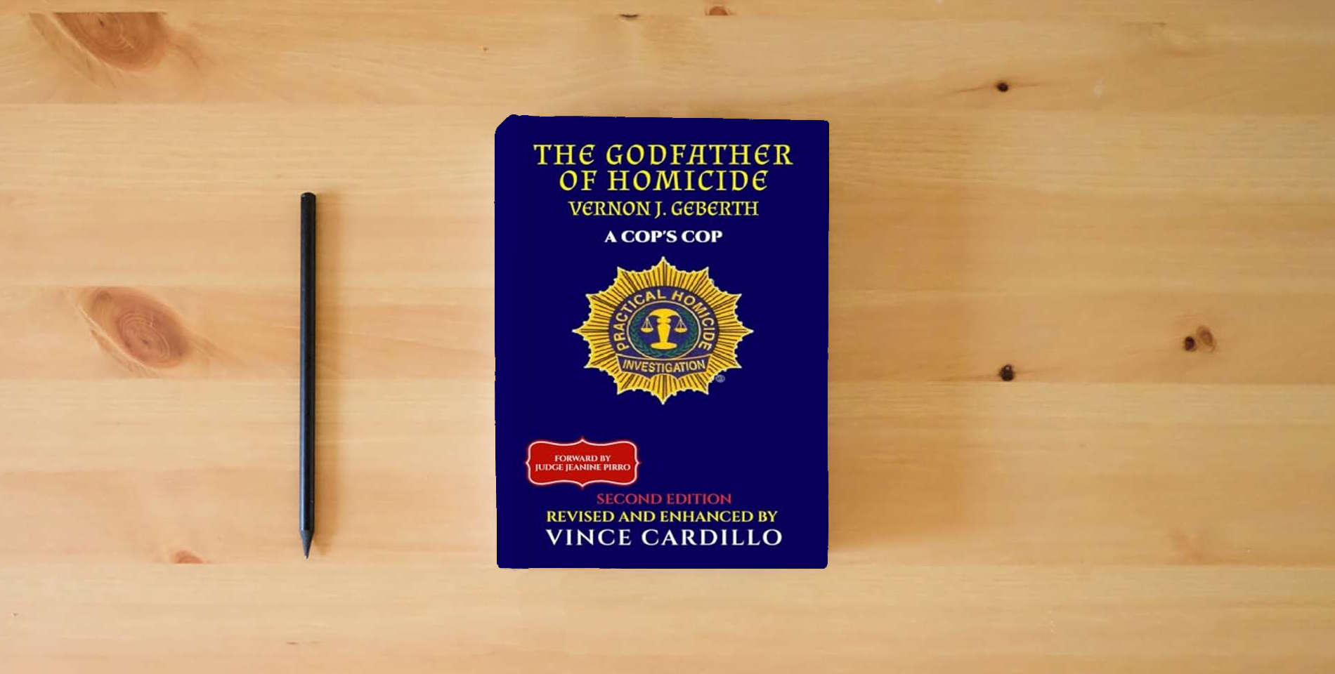 The book THE GODFATHER OF HOMICIDE: VERNON J. GEBERTH A COP'S COP is on the table