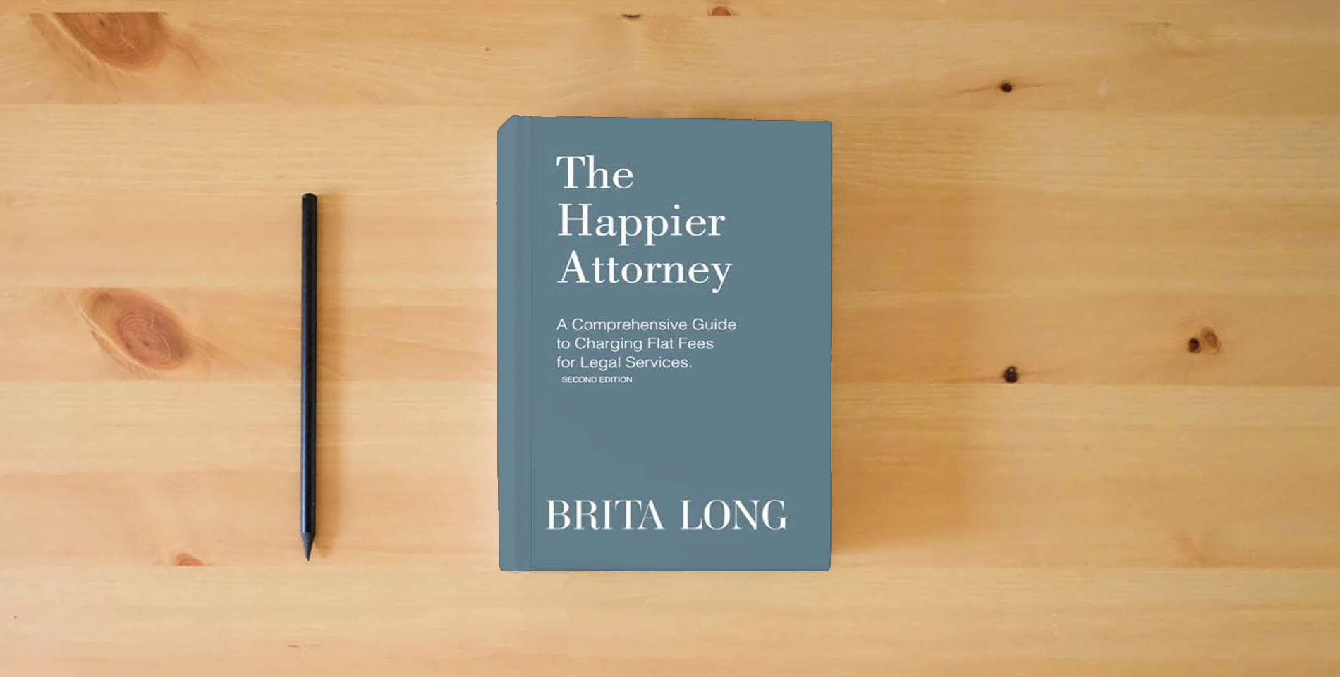 The book The Happier Attorney: A Comprehensive Guide to Charging Flat Fees for Legal Services is on the table