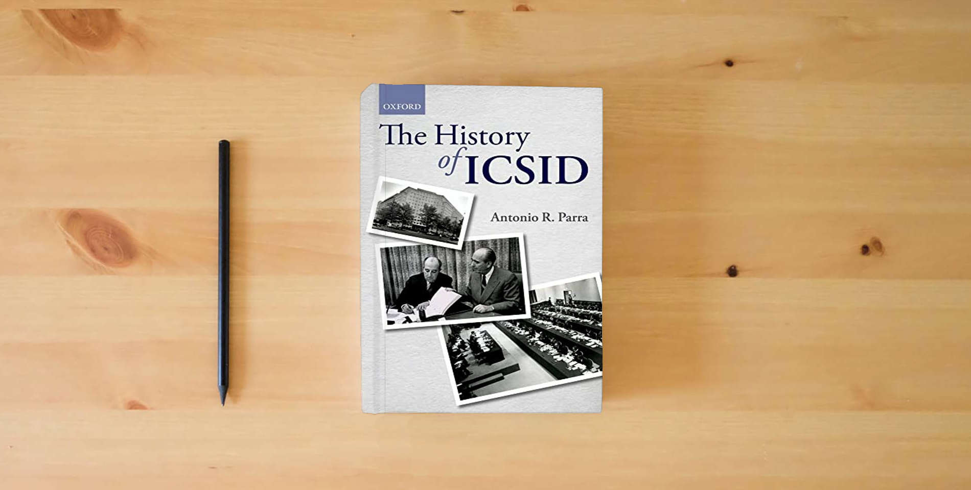 The book The History of ICSID is on the table