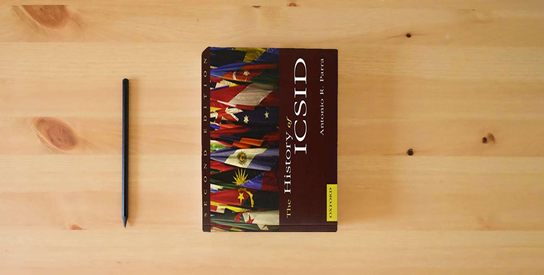 The book The History of ICSID is on the table