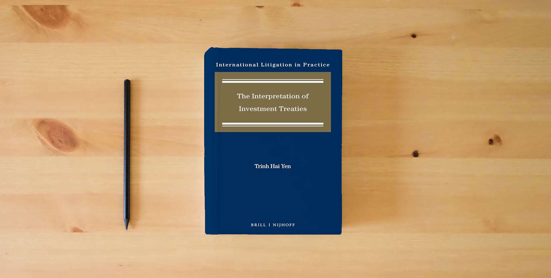The book The Interpretation of Investment Treaties (International Litigation in Practice, 7) is on the table