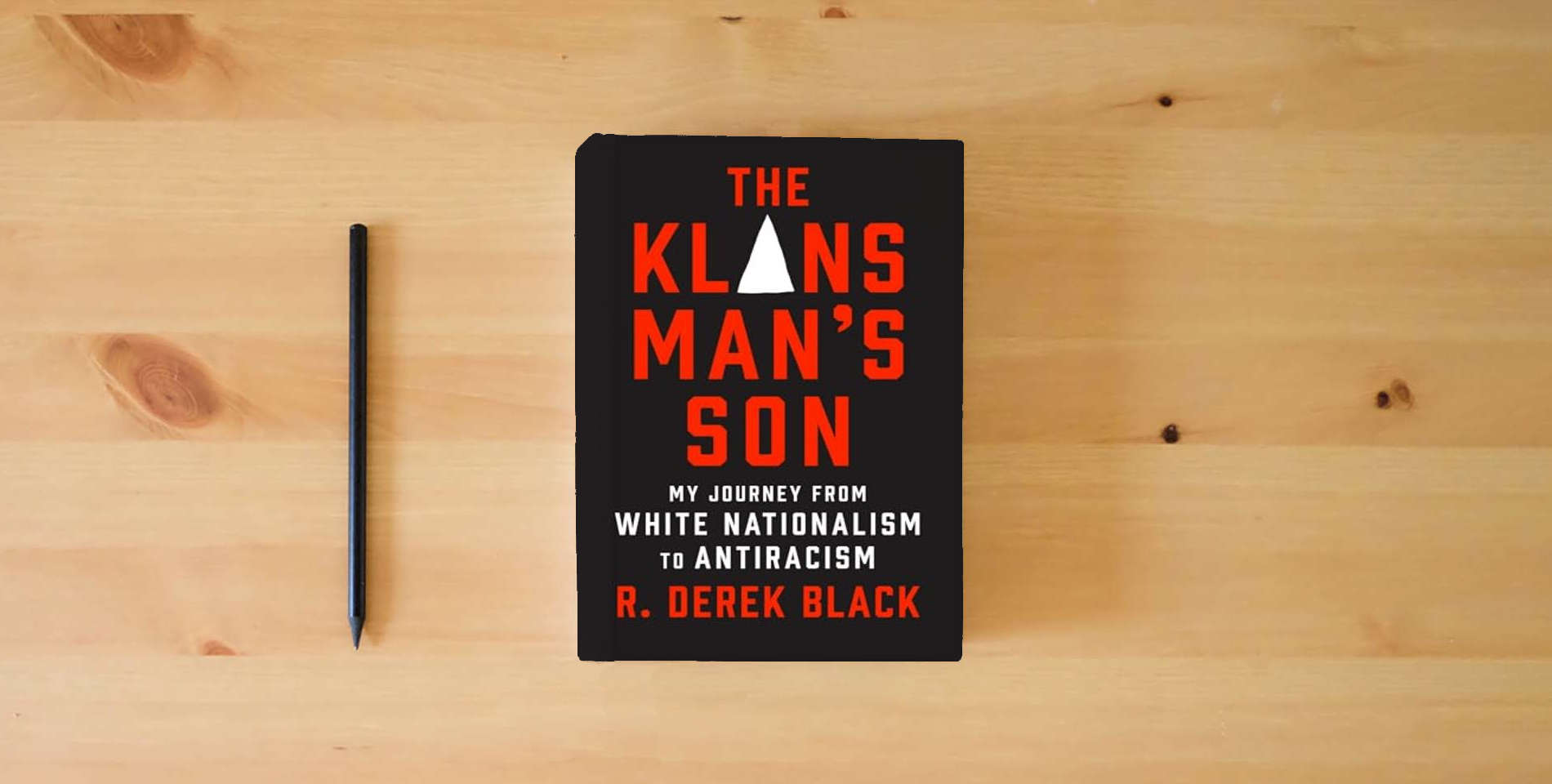 The book The Klansman’s Son: My Journey from White Nationalism to Antiracism: A Memoir is on the table
