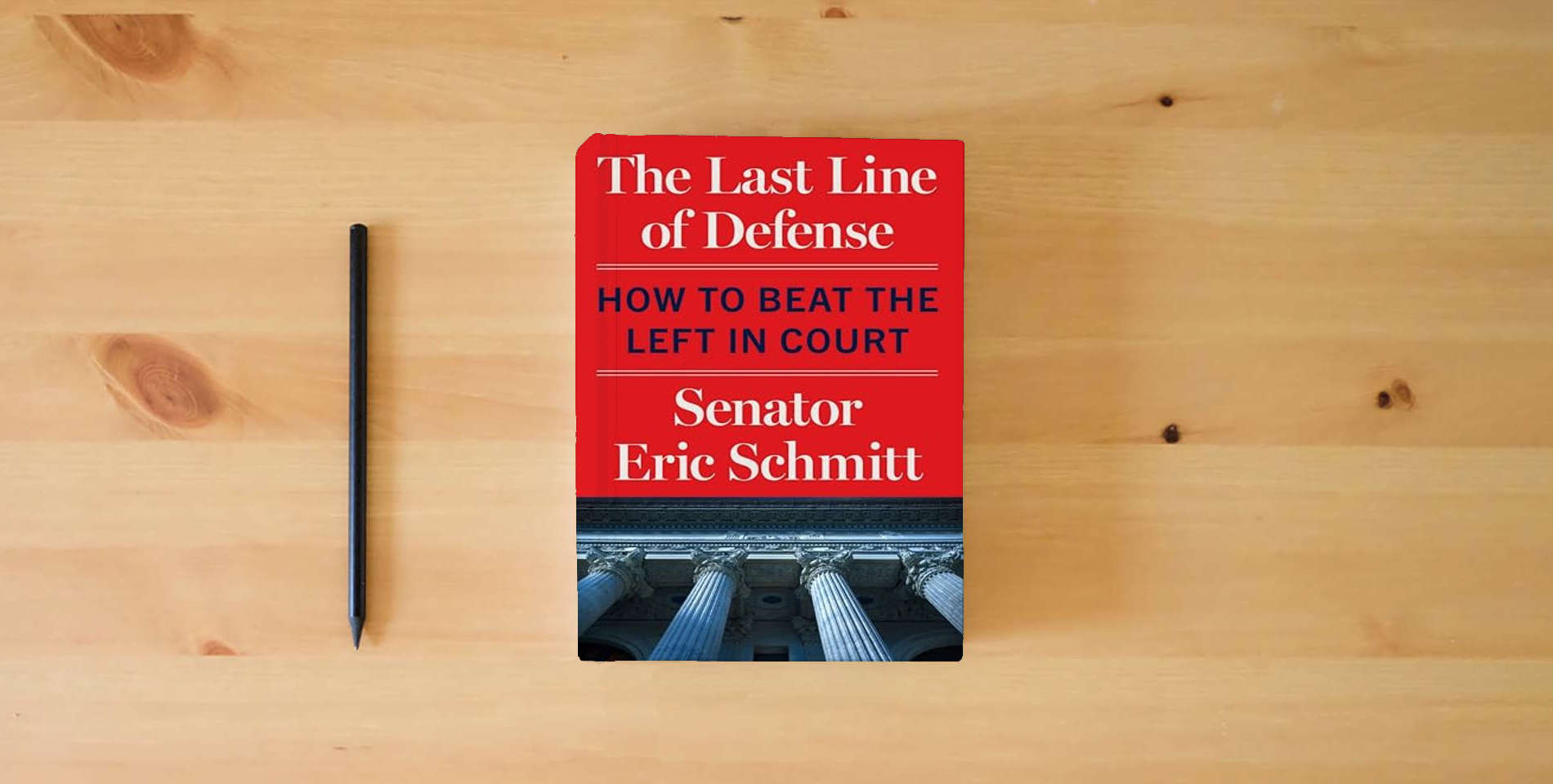 The book The Last Line of Defense: How to Beat the Left in Court is on the table