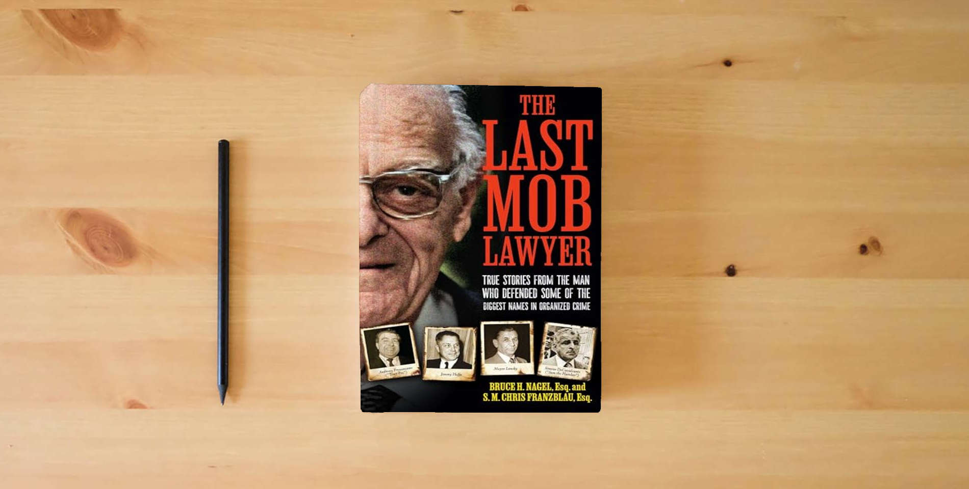 The book The Last Mob Lawyer: True Stories from the Man Who Defended Some of the Biggest Names in Organized Crime is on the table
